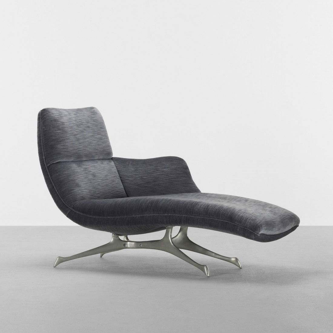 Vladimir Kagan VK chaise: Vladimir Kagan VK chaise Vladimir Kagan Design Group USA, 1999 upholstery, aluminum 60 w x 27 d x 38 h inches Signed with applied metal studio label to underside: [Kagan The New York Collection]. Lite