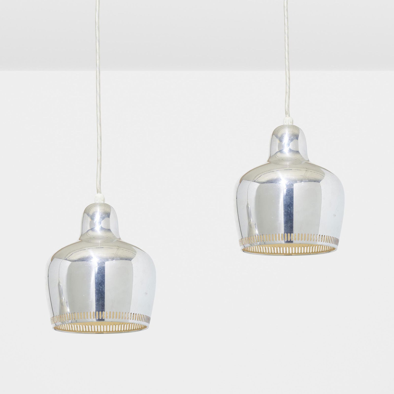Alvar Aalto, Pendant lamps model A330, pair: Alvar Aalto Pendant lamps model A330, pair Valaistustyo KyFinland, 1936aluminum 8 h × 6.25 dia in (20 × 16 cm) Literature: Alvar Aalto & Aino Aalto Design