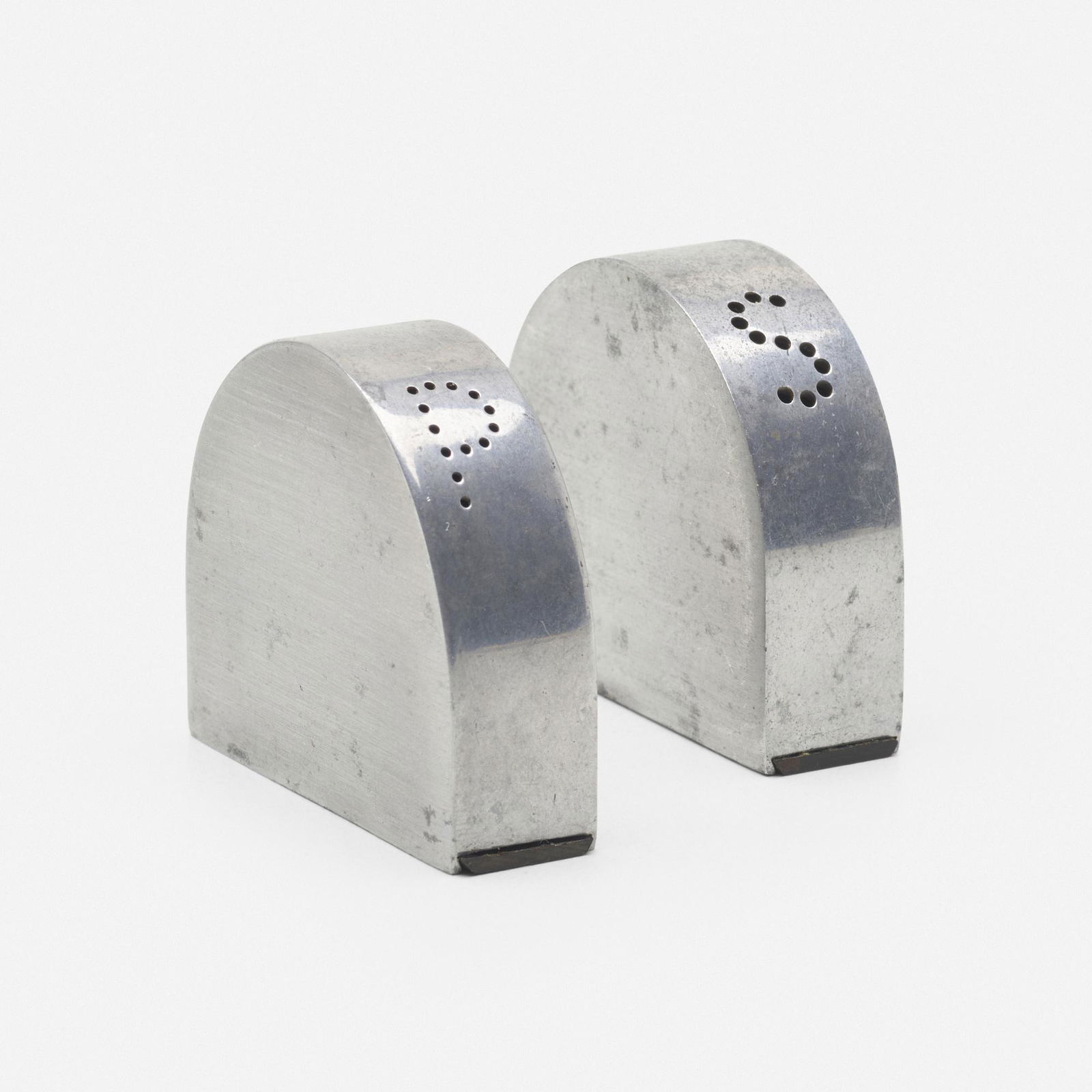 William Lescaze, Duet salt and pepper shakers: William Lescaze Duet salt and pepper shakers Revere Copper and Brass, Inc.Switzerland/USA, c. 1935special alloy, Bakelite 1.75 h × 2 w × .5 d in (4 × 5 × 1 cm) Wi