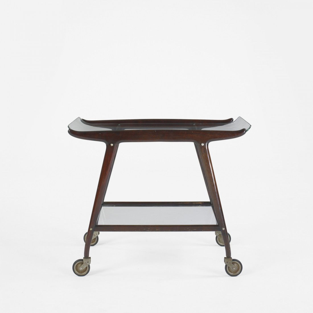 Osvaldo Borsani, attribution tea cart: Osvaldo Borsani, attribution tea cart Italy, c. 1960 mahogany, glass, brass 32 w x 19 d x 27 h inches