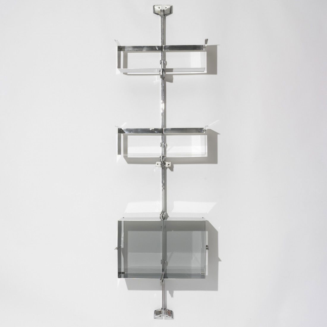 Vittorio Introini shelving unit: Vittorio Introini shelving unit Saporiti Italy, 1969 stainless steel, chrome-plated steel, glass 25.5 w x 14 d x 91 h inches Literature: Design Since 1945, Hiesinger, pg. 126