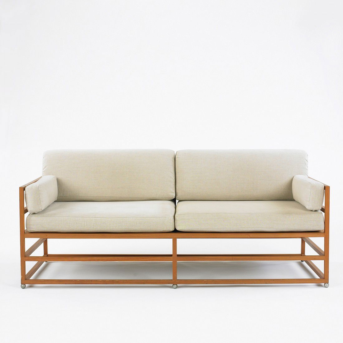 Hugh Newell Jacobsen Linear sofa from Windsor I, V: Hugh Newell Jacobsen Linear sofa from Windsor I, Vero Beach, Florida Corkey's Woodworking USA, 1997 deadhead Cypress, upholstery, stainless steel 72 w x 33 d x 31 h inches Provenance: Mr. and Mrs. Dav