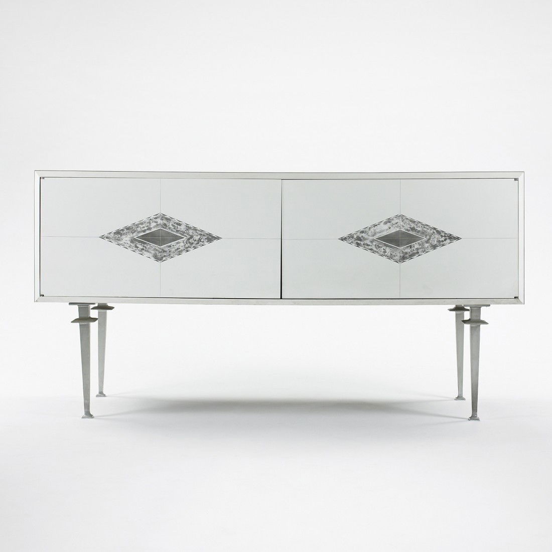 Paul Laszlo cabinet: Paul Laszlo cabinet Laszlo, Inc. USA, c. 1960 laminate, aluminum 59 w x 19 d x 30 h inches Cabinet features two doors concealing six adjustable shelves. Literature: Paul Laszlo, manufacturer's catalog