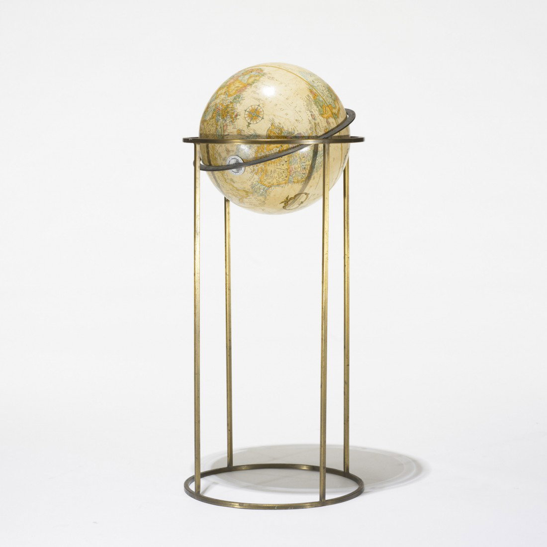In the manner of Paul McCobb globe: In the manner of Paul McCobb globe USA, c. 1955 printed paper mounted on wood, brass 14.5 dia x 35 h inches