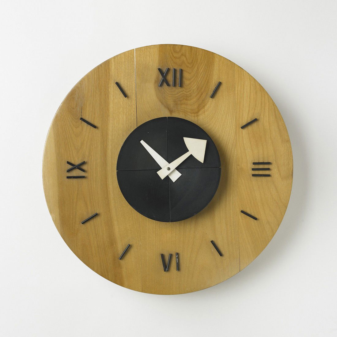 George Nelson & Associates wall clock, model 4758B: George Nelson & Associates wall clock, model 4758B Howard Miller Clock Company USA, 1949 birch, enameled wood, enameled steel, enameled aluminum 14.25 w x 3.5 d x 14.25 h inches Signed with stamped ma