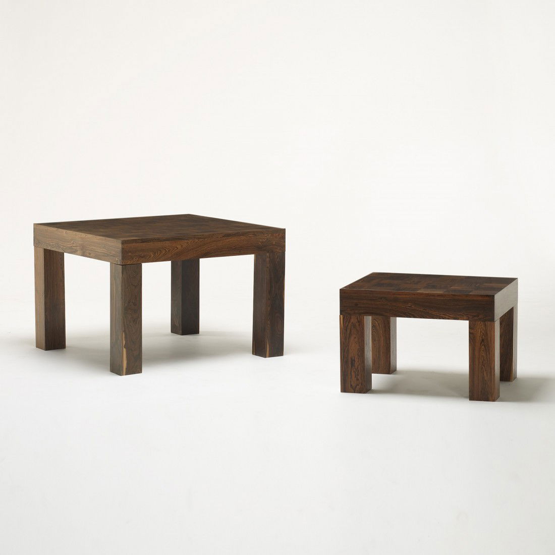 Don Shoemaker nesting tables, pair: Don Shoemaker nesting tables, pair Señal Mexico, c. 1965 rosewood 32 w x 32 d x 22 h inches Additional table measures: 20 w x 24 d x 16 h inches. Signed with decal studio label to underside of one ex