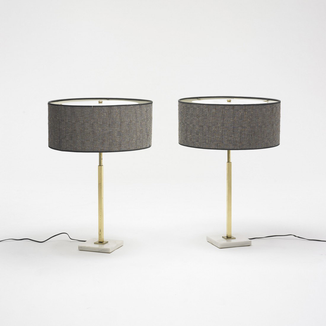 Stiffel table lamps, pair: Stiffel table lamps, pair USA, c. 1960 brass, marble, linen, enameled perforated metal 19 dia x 28 h inches Signed with decal manufacturer's label to fixture of each example: [Stiffel]. Signed with mo