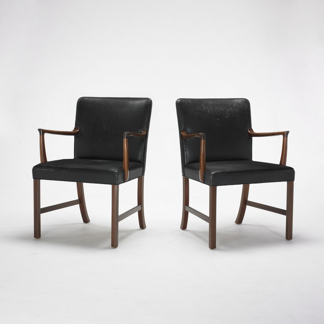 Ole Wanscher armchairs, pair: Ole Wanscher armchairs, pair A.J. Iversen Snedkermester Denmark, 1961 Cuban mahogany, leather 25.5 w x 26 d x 35 h inches Signed with decal manufacturer's label to underside of each example: [Snedkerm