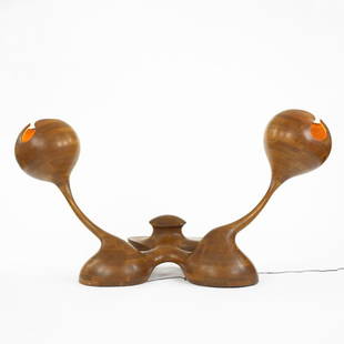 Robert Worth sculptural lamp: Robert Worth sculptural lamp USA, c. 1970 carved and laminated walnut, glass 84 w x 34 d x 44 h inches Robert Worth was the head of Woodcrafts at the Philadelphia College of Art. Branded