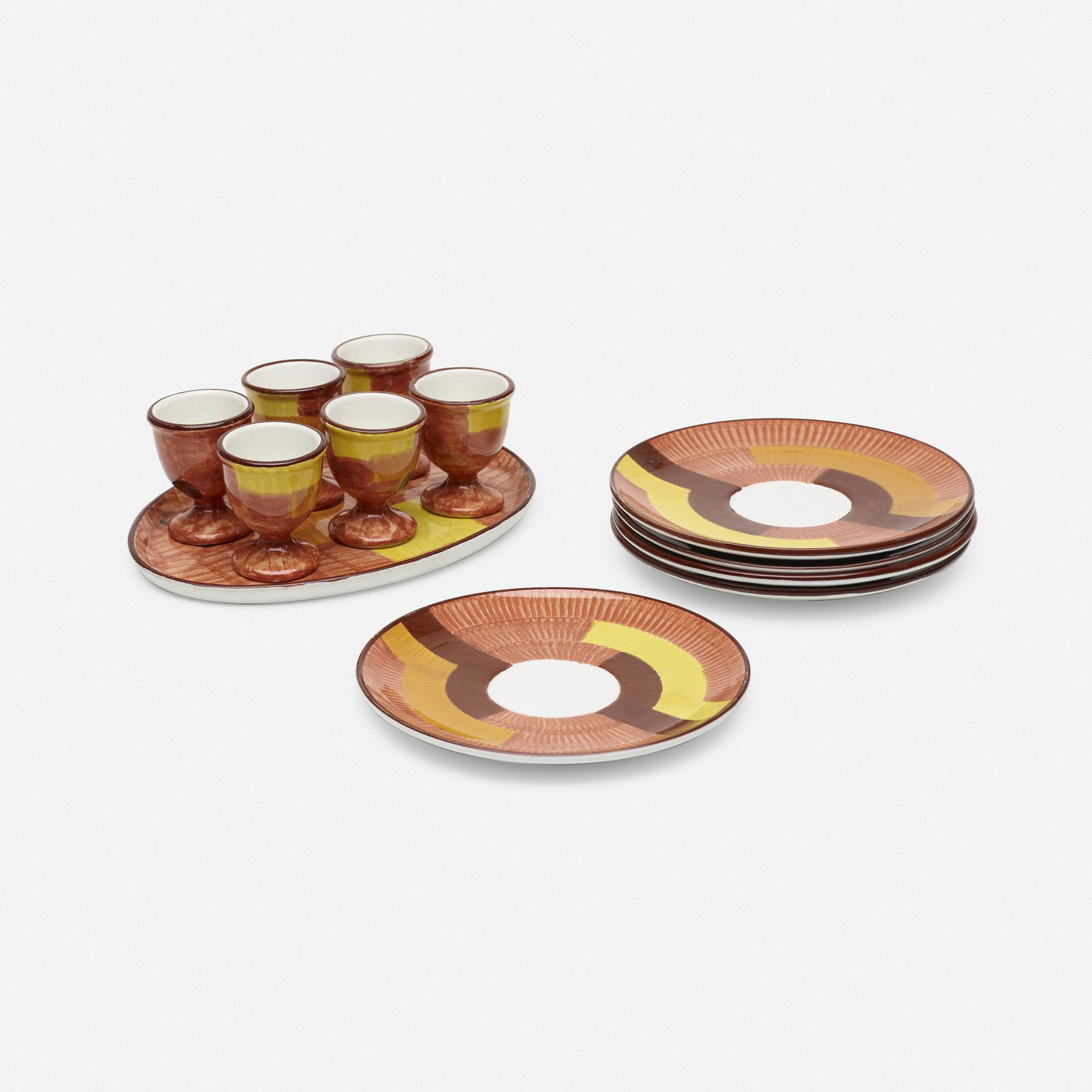 Schramberg Majolikafabrik, Tableware: Schramberg Majolikafabrik Tableware Germany, c. 1930glazed porcelain 0.5 h × 8.5 w × 6 d in (1 × 22 × 15 cm) Collection is comprised of six egg cups, one tray, and five