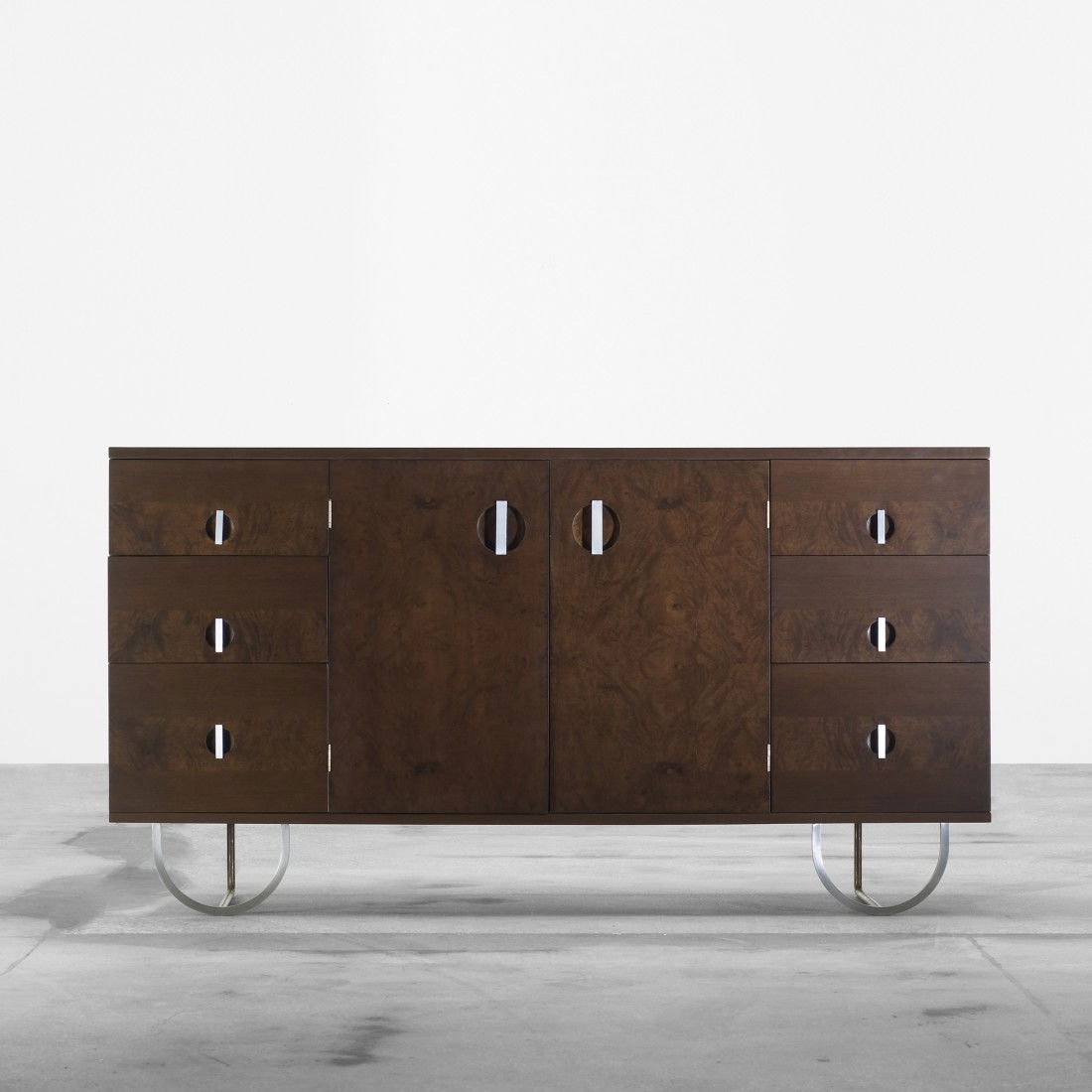 Gilbert Rohde cabinet, model 3321: Gilbert Rohde cabinet, model 3321 Herman Miller USA, 1933 Maidou burl, mahogany, matte chrome-plated steel and brass 66 w x 17 d x 35 h inches Cabinet features six drawers and two doors concealing one