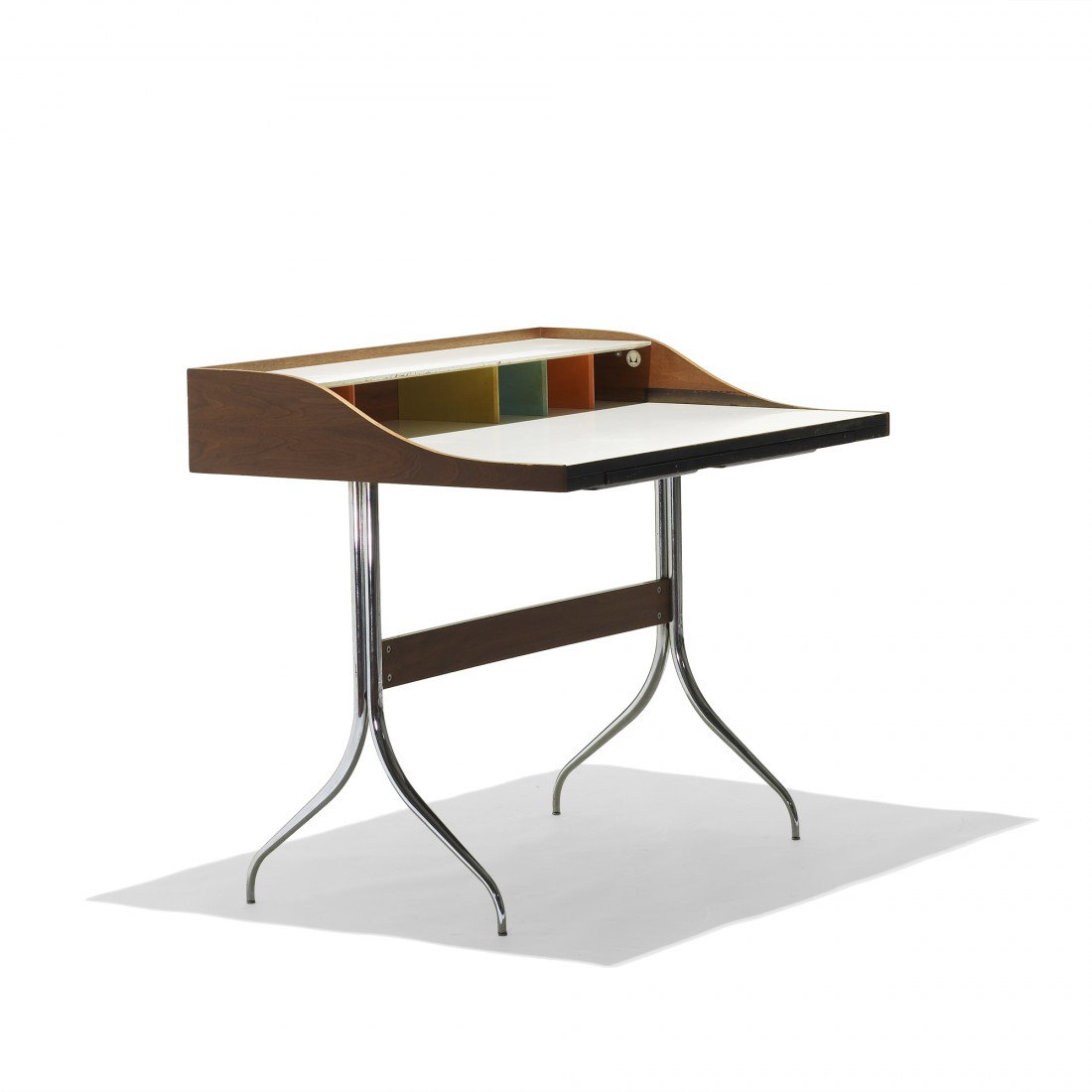 George Nelson & Associates Swaged-Leg desk: George Nelson & Associates Swaged-Leg desk, model 5850 Herman Miller USA, 1954/1958 walnut, laminate, chrome-plated steel, lacquered wood 39 w x 28.5 d x 34.25 h inches Signed with applied disc manufa