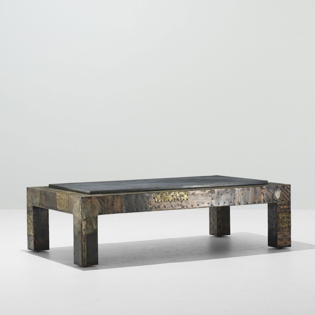 Paul Evans coffee table, model PE 45: Paul Evans coffee table, model PE 45 Paul Evans Studio for Directional USA, c. 1965 patinated steel, copper, slate 56 w x 32 d x 16 h inches Literature: Directional, manufacturer's catalog, unpaginate