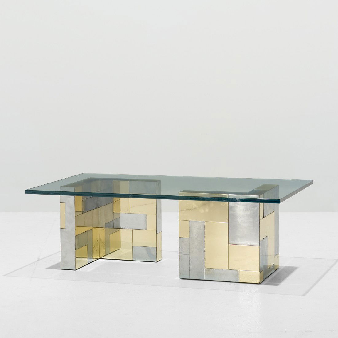 Paul Evans Cityscape coffee table: Paul Evans Cityscape coffee table Paul Evans Studio for Directional USA, c. 1975 chrome-plated steel, brass, glass 48 w x 28 d x 15.75 h inches Provenance: Collection of John R. Eckel, Jr.