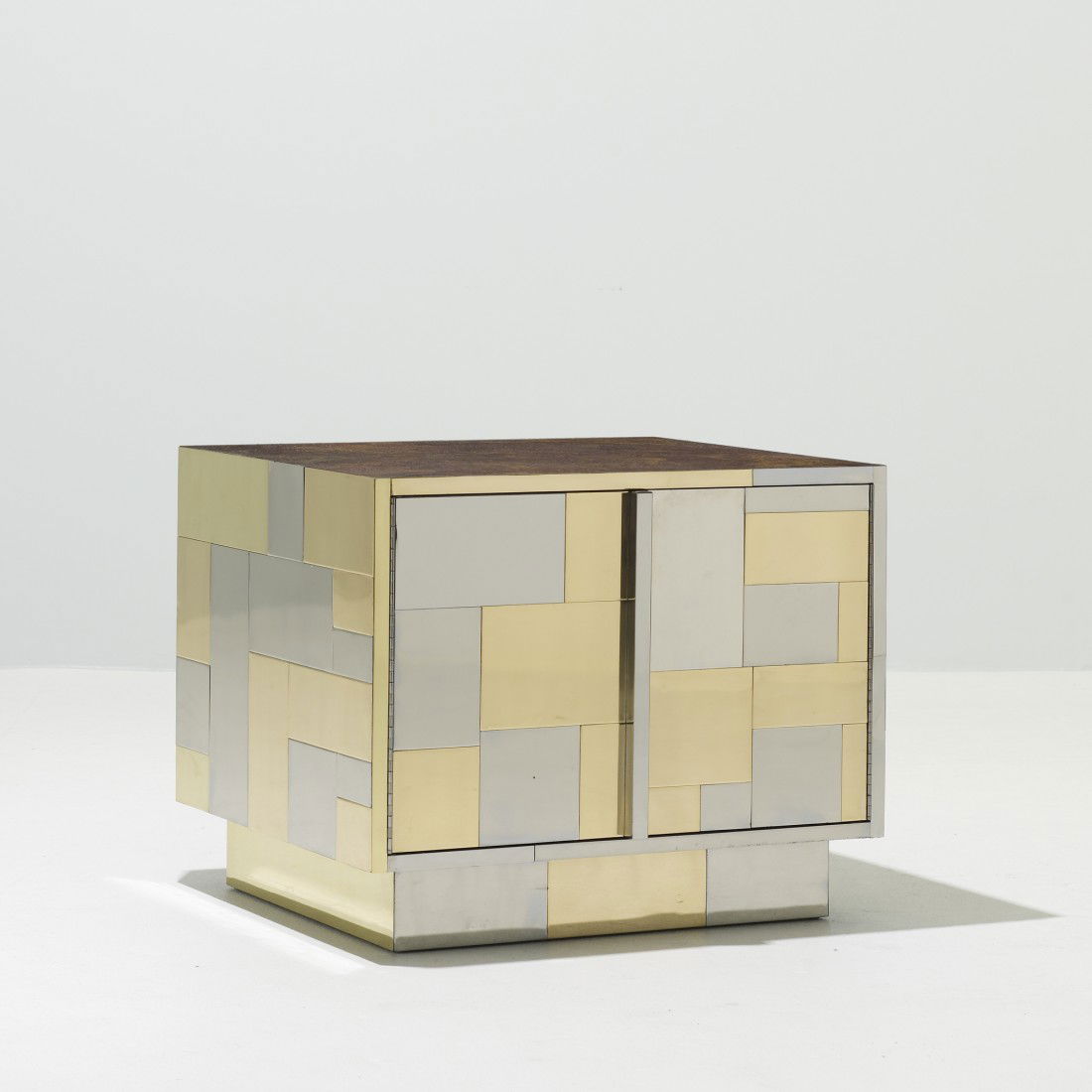 Paul Evans Cityscape cabinet: Paul Evans Cityscape cabinet Paul Evans Studio for Directional USA, c. 1975 chrome-plated steel, brass, laminate 24.25 w x 26.75 d x 21.75 h inches Cabinet features two doors concealing storage. Prove