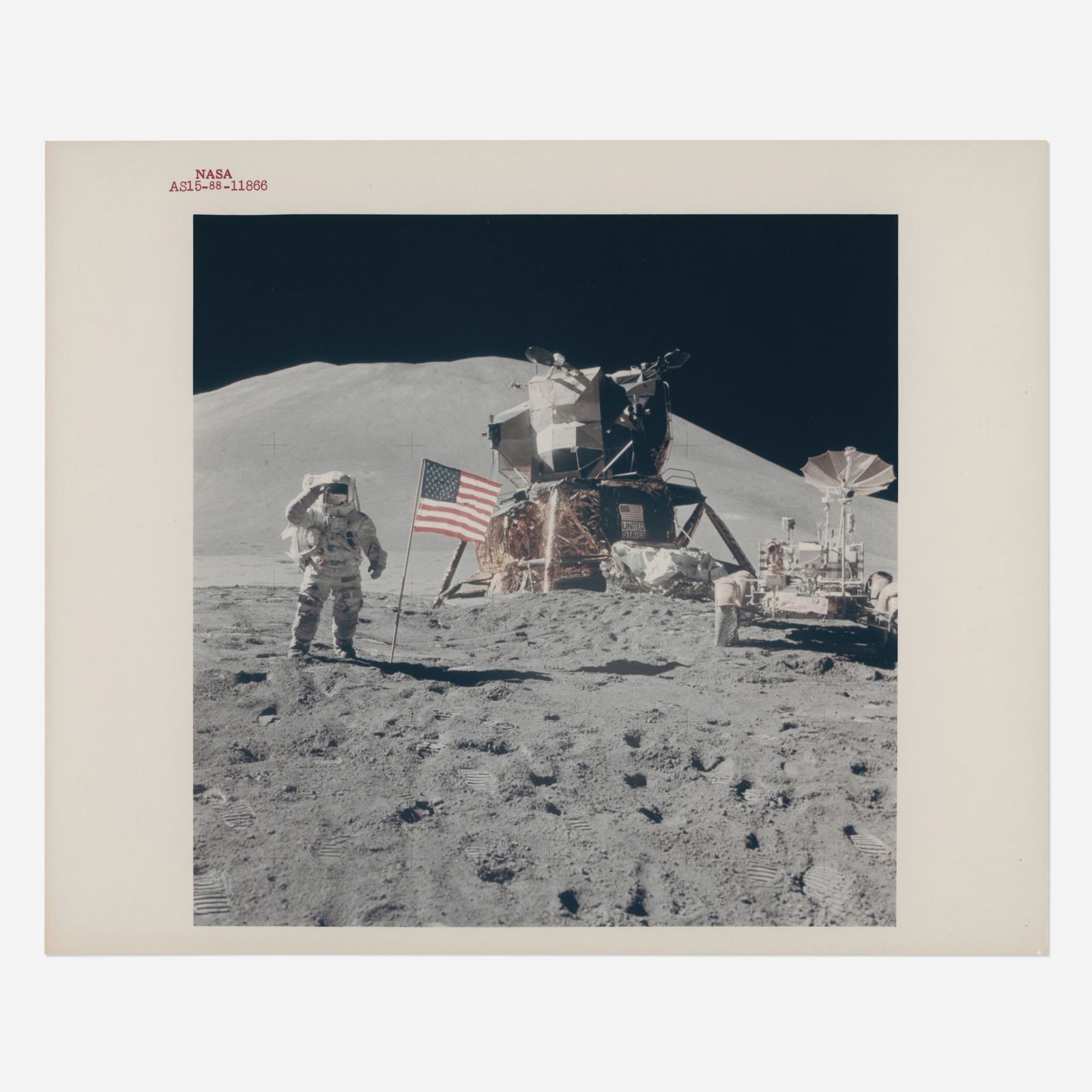 James Irwin saluting the US flag at Hadley Base: James Irwin saluting the US flag at Hadley Base, David Scott [Apollo 15], 26 July - 7 August 1971, EVA 3 printed 1971vintage chromogenic print on fiber-based Kodak paper 10 h × 8 w in (25 ×