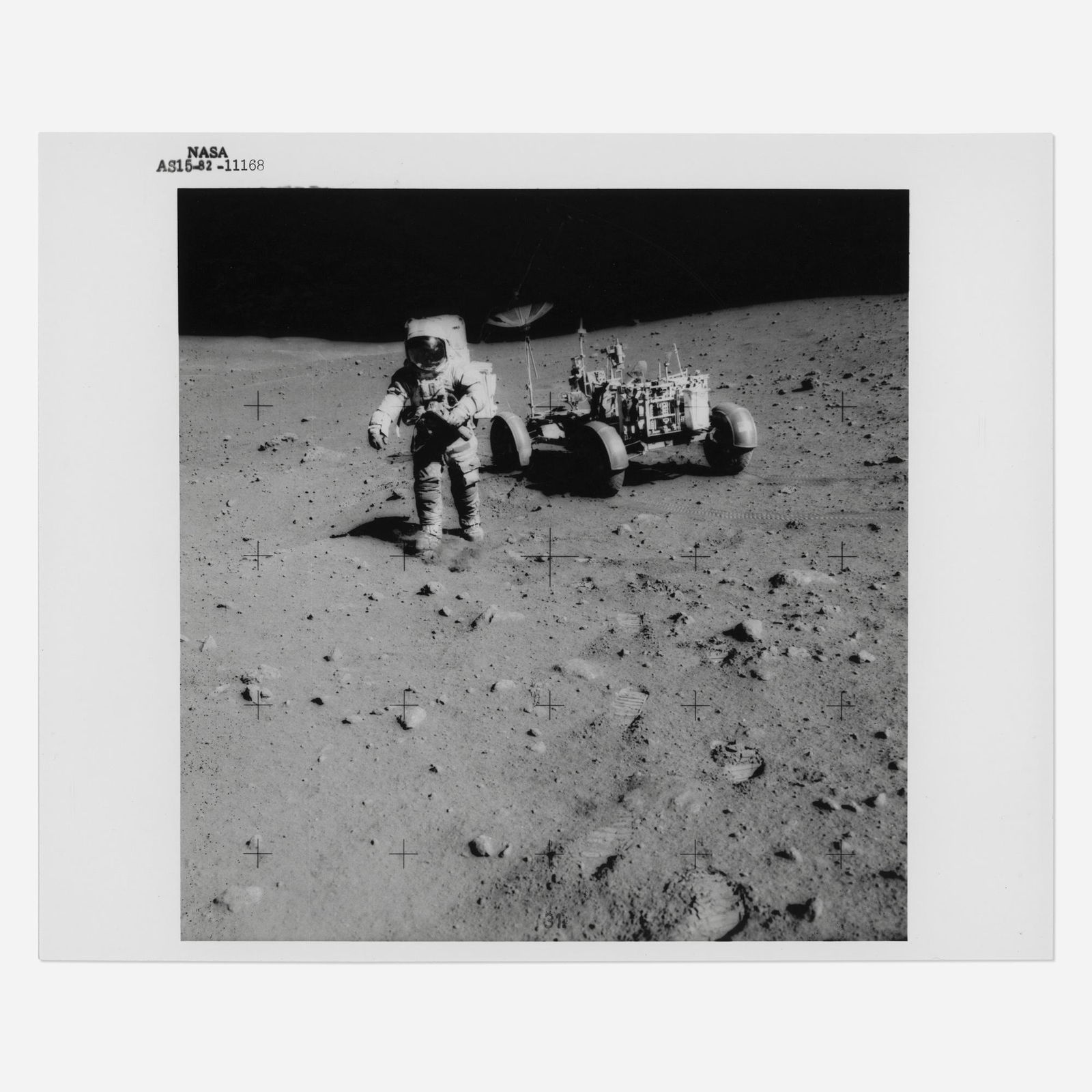 David Scott with the 500mm Hasselblad camera: David Scott with the 500mm Hasselblad camera in hand, station 10, James Irwin [Apollo 15], July 26 - August 7, 1971, EVA 3 printed 1971vintage gelatin silver print on fiber-based paper 10 h × 8