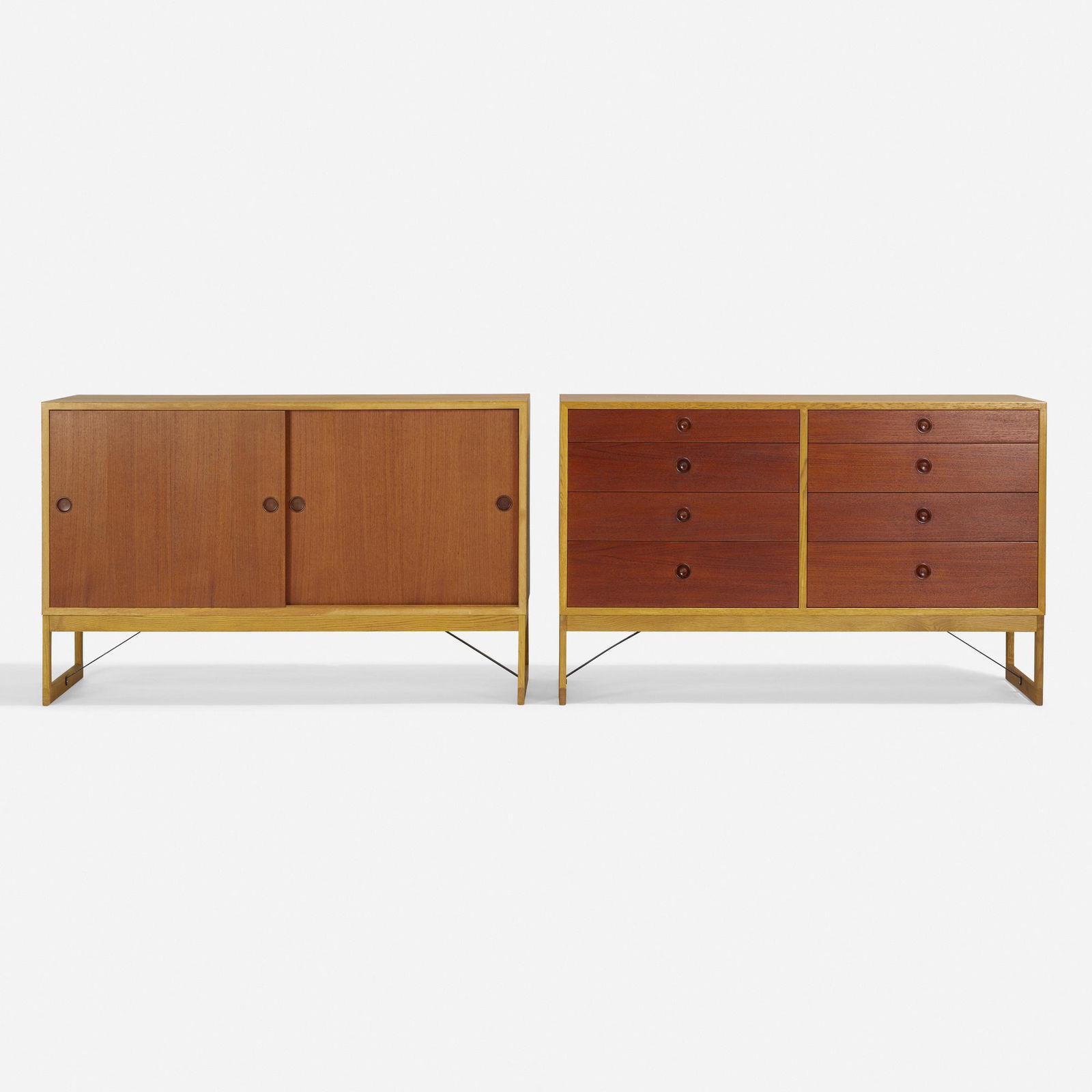 Borge Mogensen, Cabinets, pair: Borge Mogensen Cabinets, pair Karl Andersson & SonerDenmark / Sweden, c. 1955oak, teak, enameled steel 33 h × 53 w × 22 d in (84 × 135 × 56 cm) One cabinet featur
