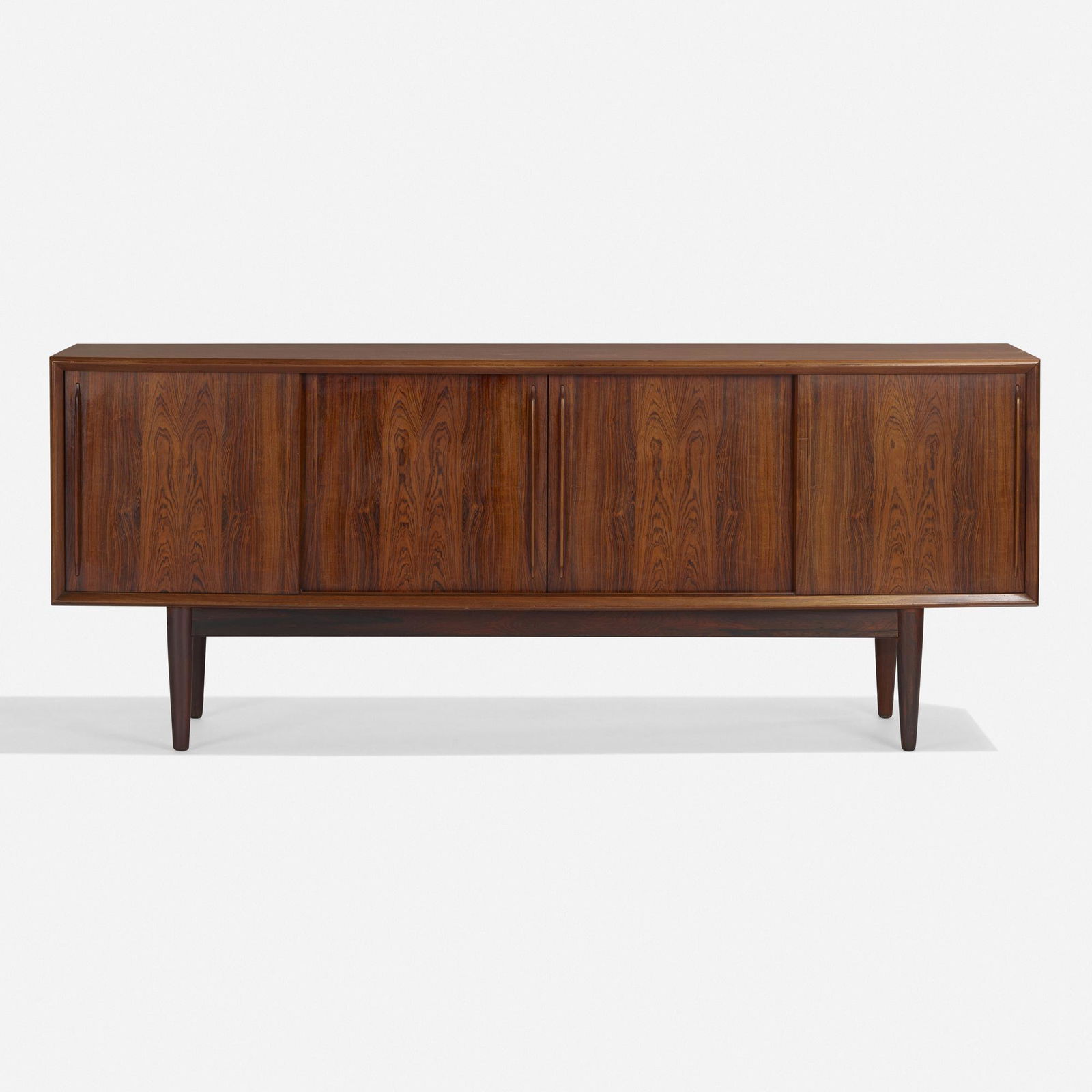 Arne Vodder, Cabinet: Arne Vodder Cabinet Sibast FurnitureDenmark, c. 1960rosewood veneer, rosewood 78.75 h × 20.25 w × 31.25 d in (200 × 51 × 79 cm) Cabinet features four sliding door