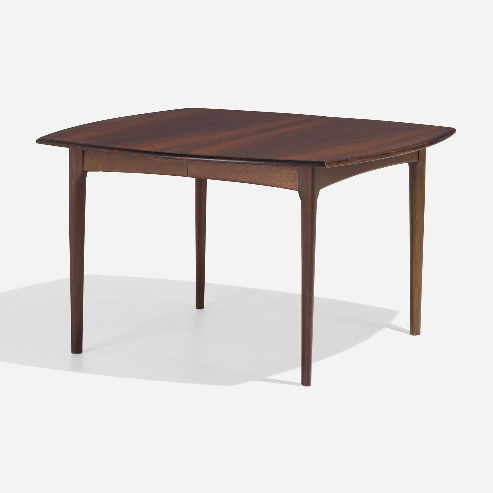 Arne Vodder, Dining table: Arne Vodder Dining table Sibast MoblerDenmark, c. 1965rosewood, teak 28.75 h × 47.25 w × 47.25 d in (73 × 120 × 120 cm) Sold with two 29.5-inch leaves; table meas