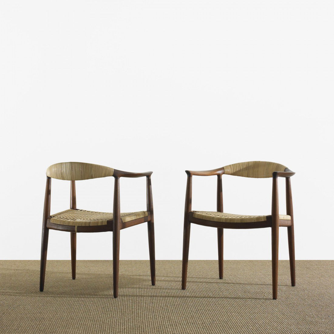 Hans Wegner The Chairs, pair: Hans Wegner The Chairs, pair Johannes Hansen Denmark, 1949 teak, cane 24.75 w x 21 d x 29.5 h inches Signed with branded manufacturer's mark to underside of each example: [Johannes Hansen Copenhagen D