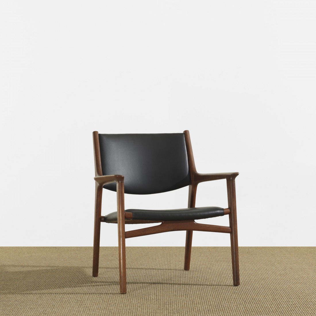 Hans Wegner lounge chair: Hans Wegner lounge chair Johannes Hansen Denmark, c. 1955 teak, leather 28 w x 25 d x 31.5 h inches Signed with applied manufacturer's label to underside: [Johannes Hansen Cabinet Maker Copenhagen Den