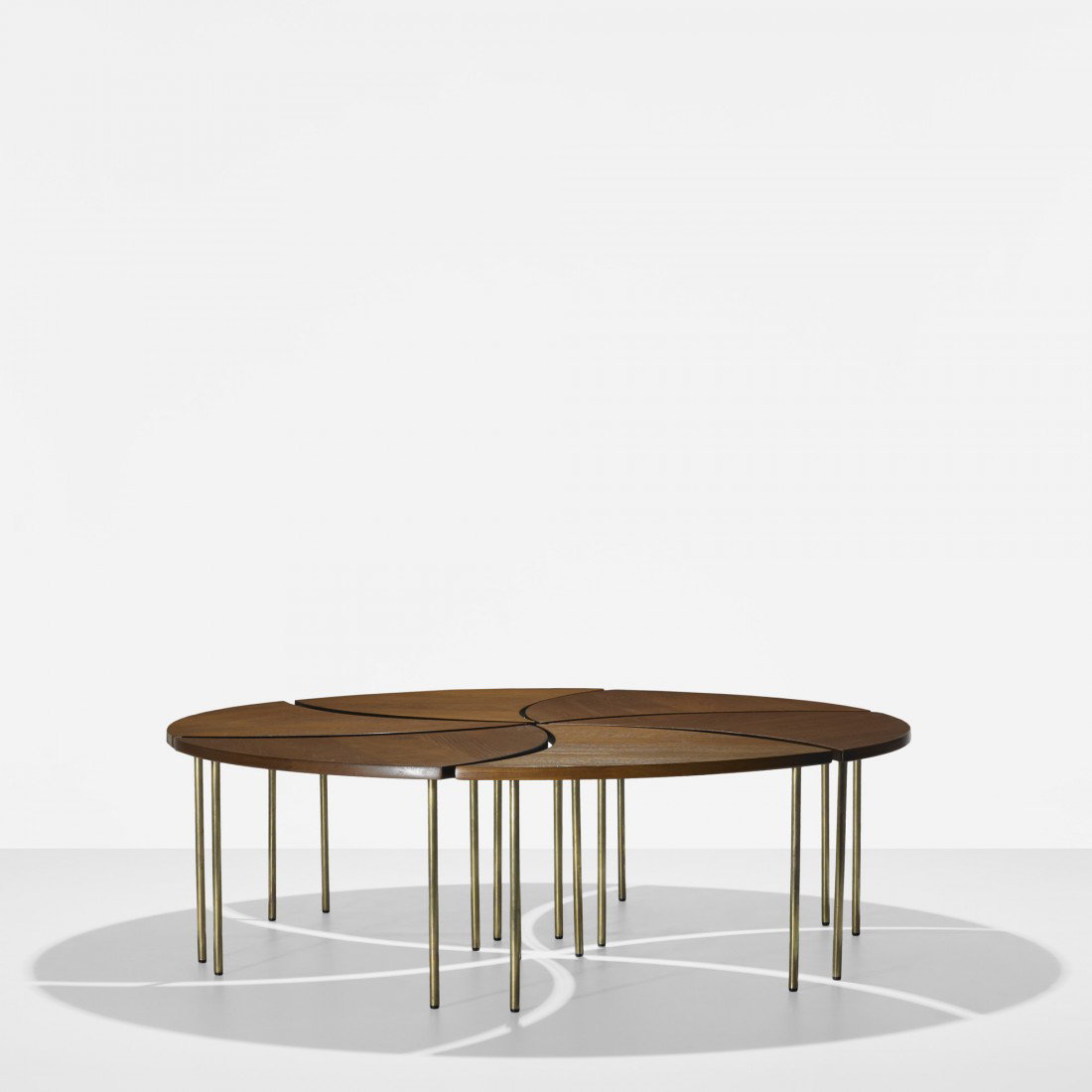 Peter Hvidt tables model 523, set of six: Peter Hvidt tables model 523, set of six France and Sons Denmark, c. 1960 teak, brass 52 dia x 17 h inches Signed with stamped manufacturer's mark to underside of each example: [FD Made in Denmark Mod