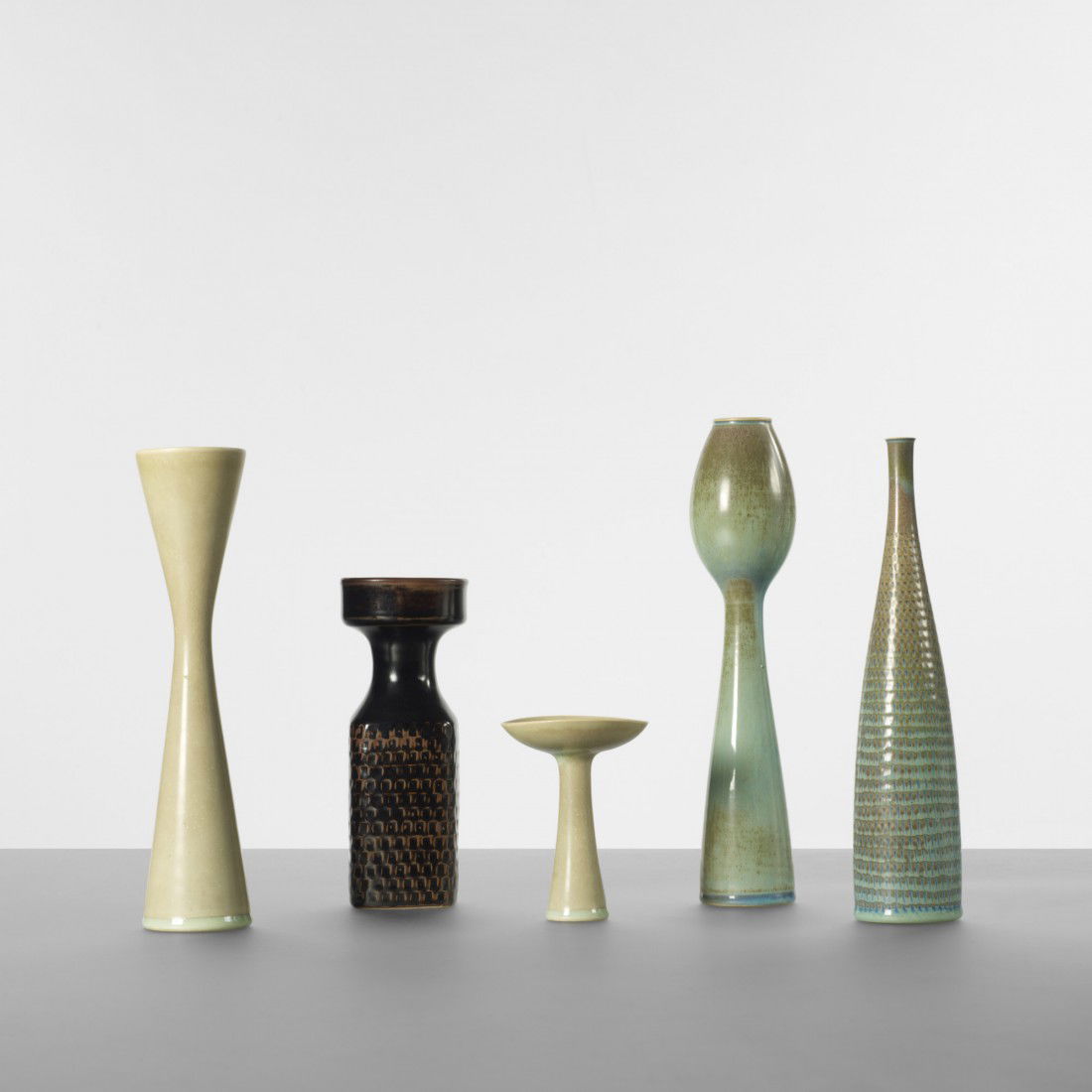 Stig Lindberg vases, set of five: Stig Lindberg vases, set of five Gustavsberg Sweden, c. 1950 glazed stoneware 22.5 dia x 10.5 h inches Signed with decal studio label to underside of one example: [Gustavsberg Sweden]. Incised signatu