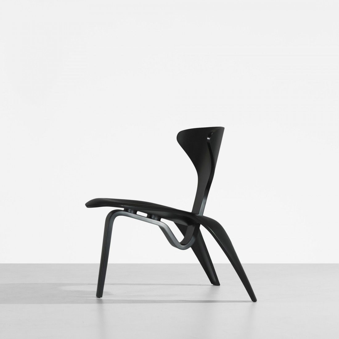 Poul Kjaerholm PK 0 lounge chair: Poul Kjaerholm PK 0 lounge chair Fritz Hansen Denmark, 1952/1997 lacquered plywood 26 w x 26 d x 27 h inches This example is from the edition of 600. Chair sold with original fabric bag. Signed with a