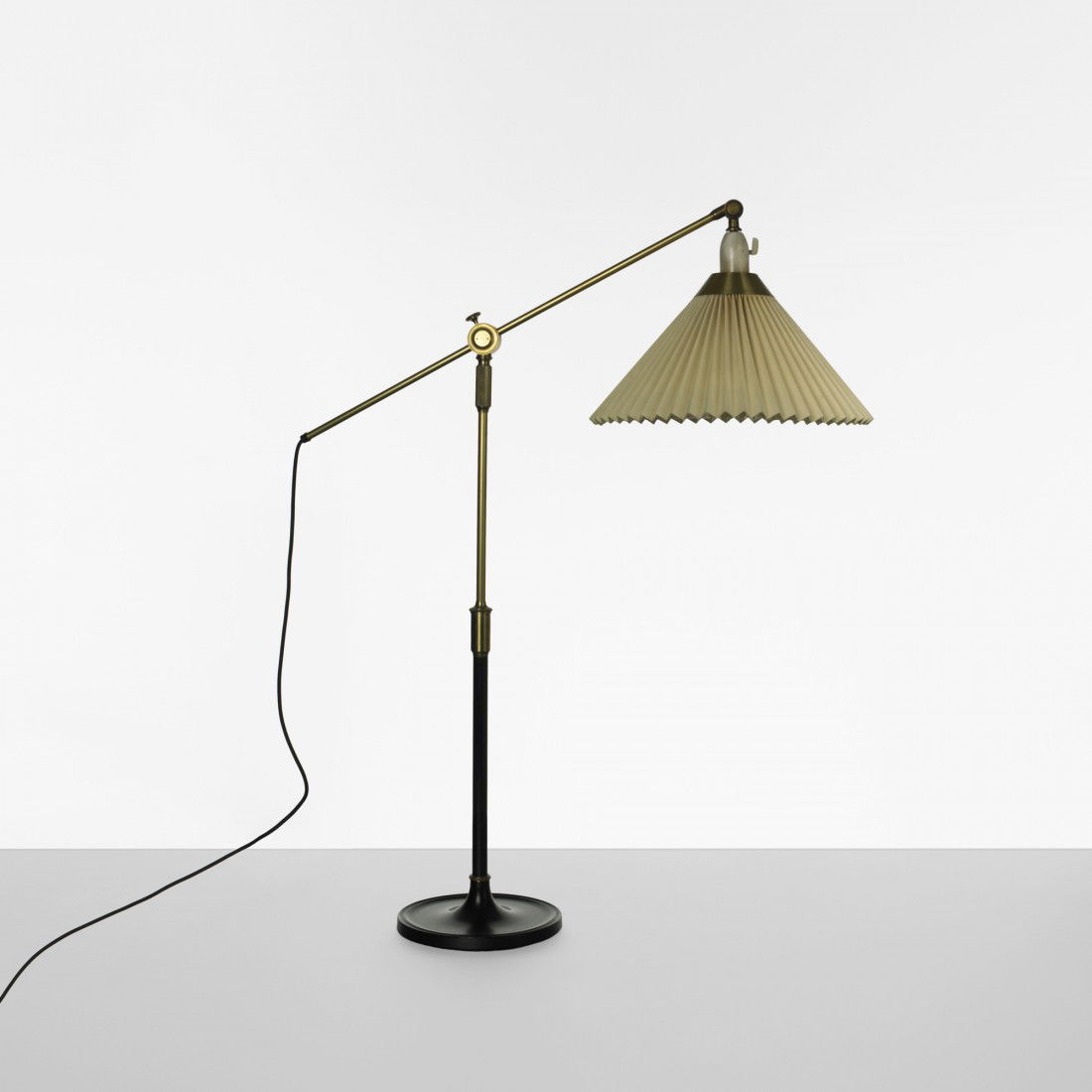 Aage Petersen table lamp: Aage Petersen table lamp Le Klint Denmark, 1949 brass, enameled steel, paper 31 w x 13.5 d x 39.5 h inches Provenance: The Collection of Dr. Carl M. Barlow