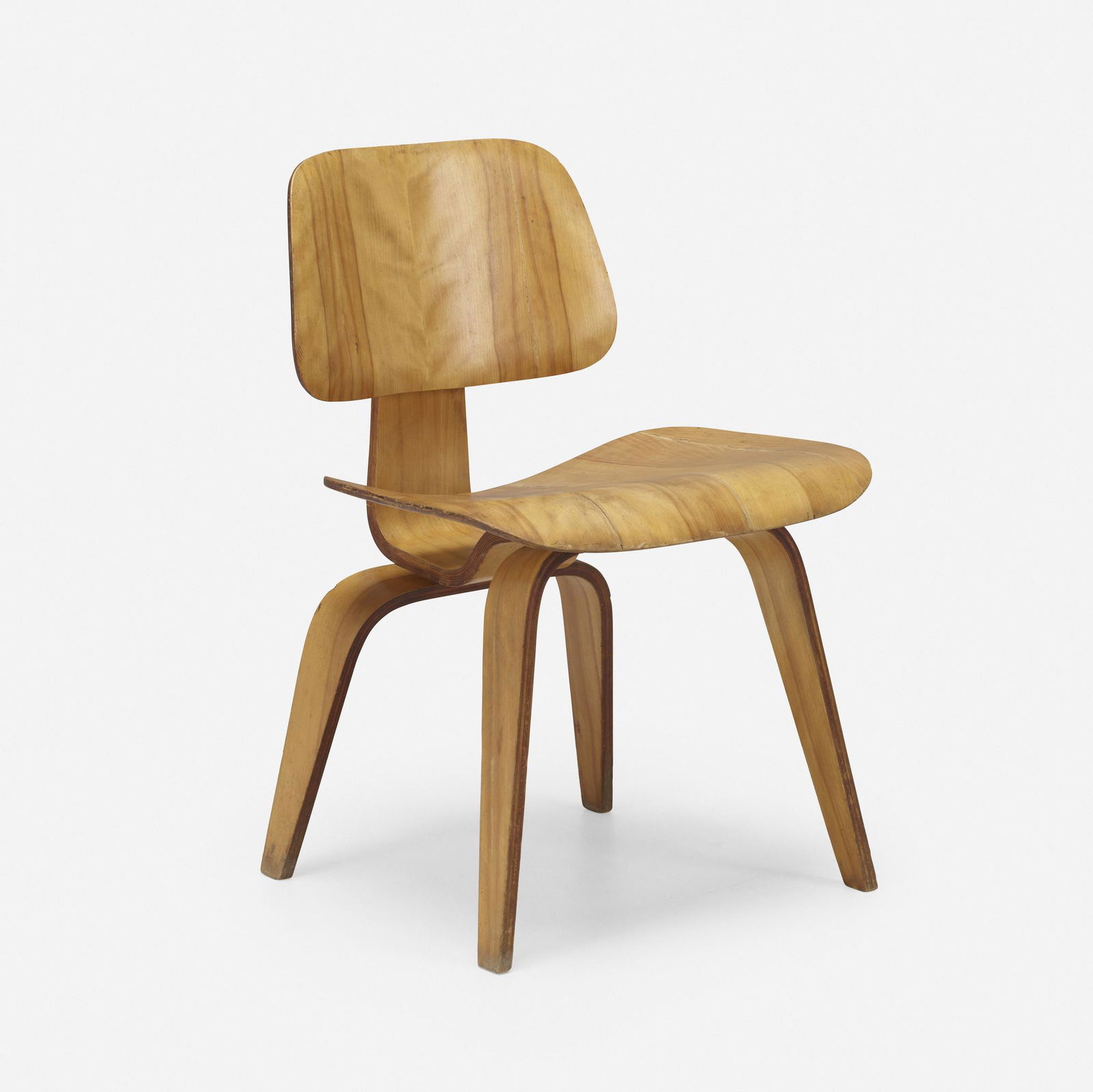 Charles and Ray Eames, DCW: Charles and Ray Eames DCW Evans Products/Herman MillerUSA, 1945 / c. 1948ash plywood, rubber 29 h x 19.5 w x 21 d in (74 x 50 x 53 cm) This early example features a 5-2-5 hardware config