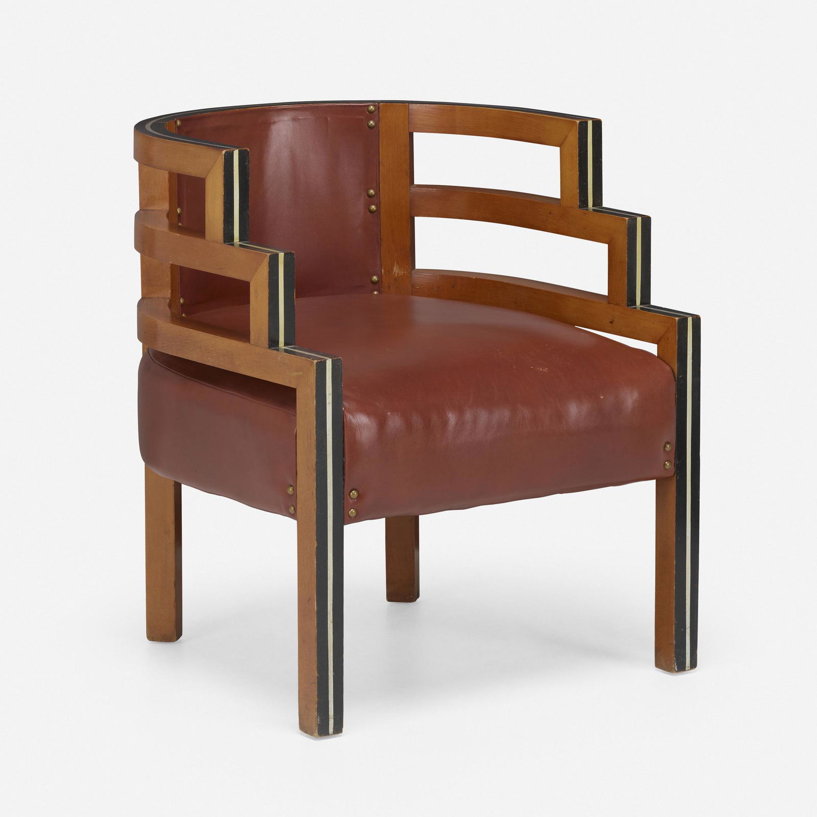 In the manner of Kem Weber, Armchair: In the manner of Kem Weber Armchair USA, c. 1950lacquered and stained mahogany, leather, brass 27.5 h x 23 w x 25 d in (70 x 58 x 63 cm) Provenance: Collection of Mark McDonal