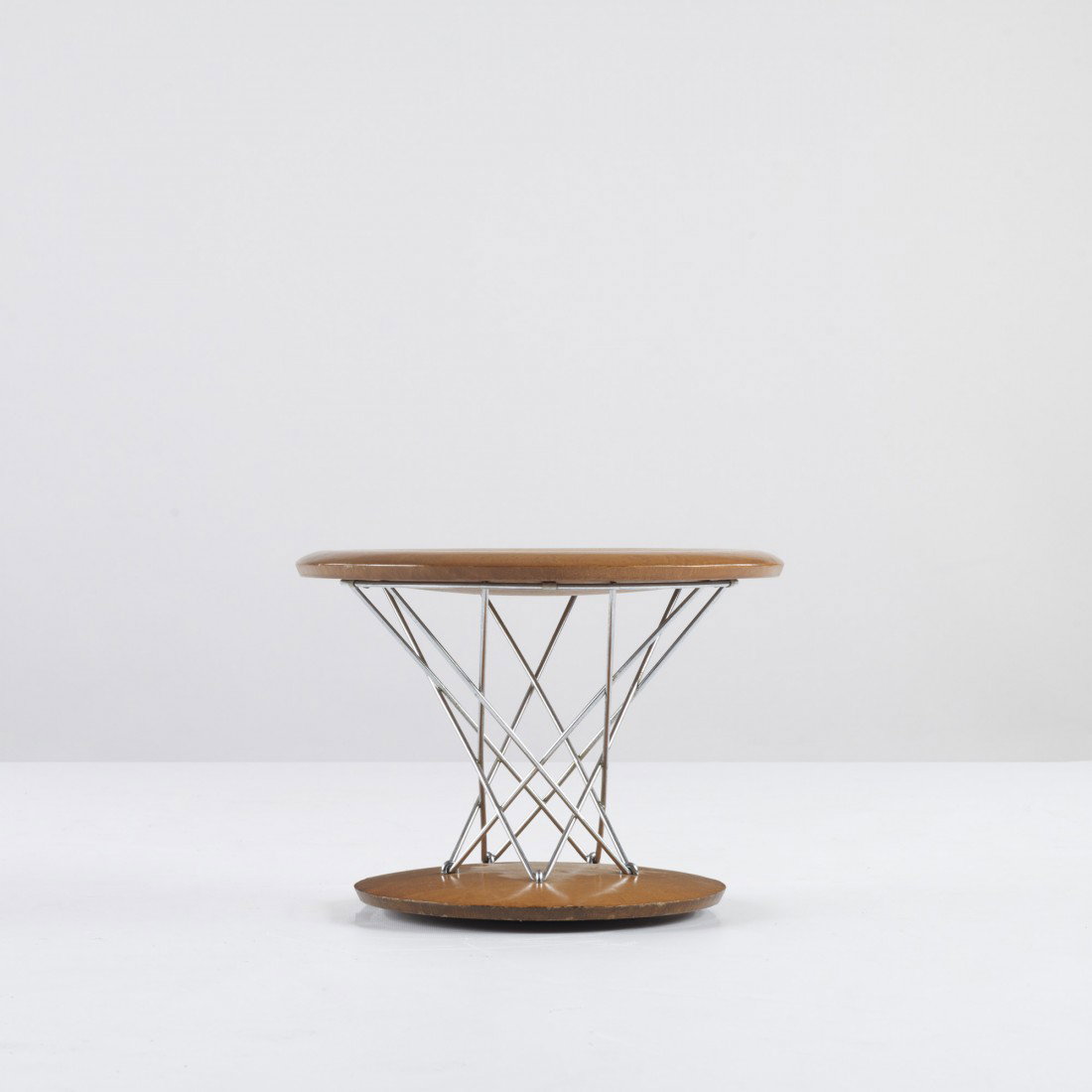 Isamu Noguchi Rocking Stool, model 85T: Isamu Noguchi Rocking Stool, model 85T Knoll USA, 1955 walnut, chrome-plated steel 14 dia x 10.5 h inches Literature: Isamu Noguchi: Sculptural Design, Eisenbrand, Posch and von Vegesack, pg. 128 Prov