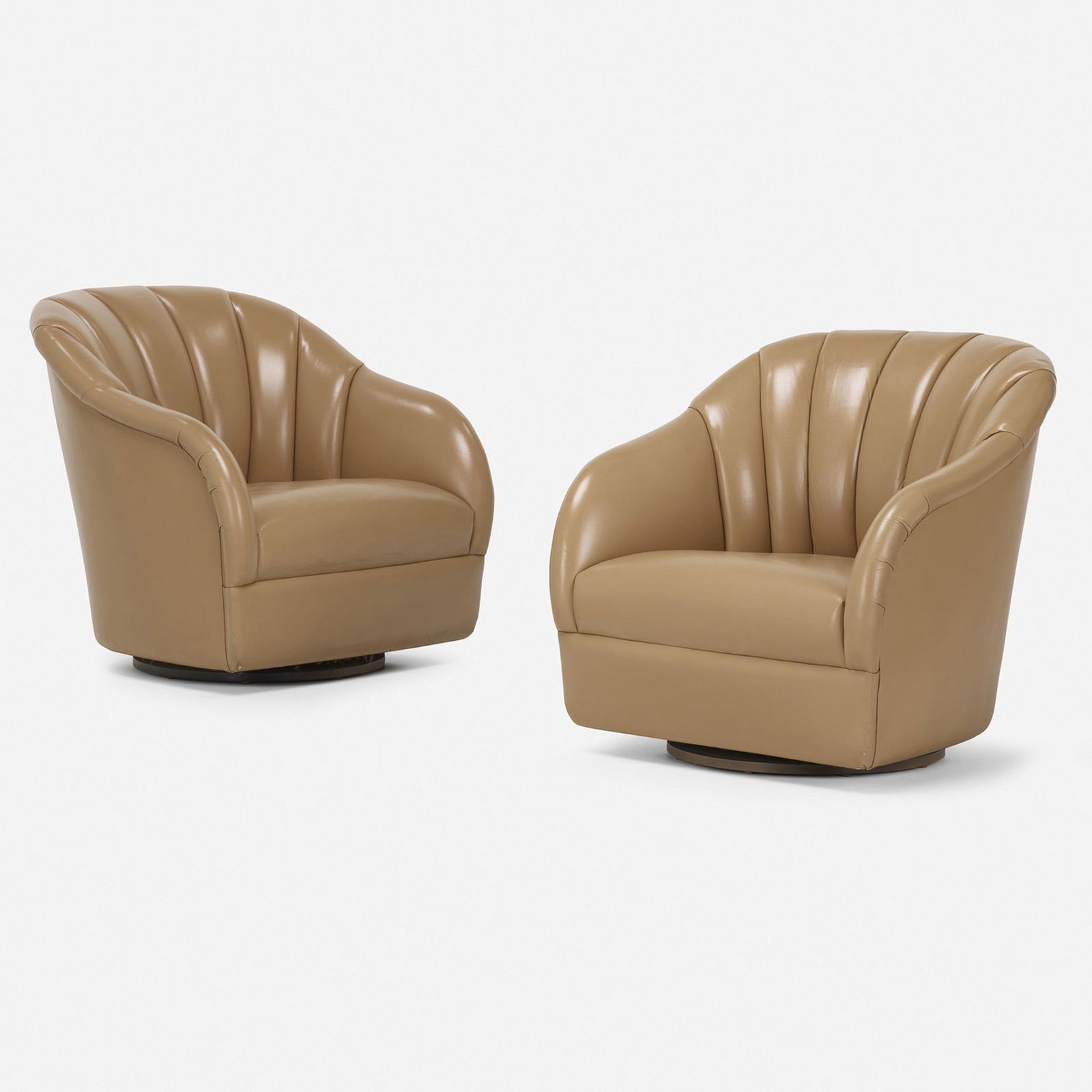 Ward Bennett, Swivel lounge chairs: Ward Bennett Swivel lounge chairs Brickel AssociatesUSA, c. 1970leather upholstery 30.5 h x 31 w x 31 d in (77 x 79 x 79 cm) This work will ship from Rago in Lambertville, N