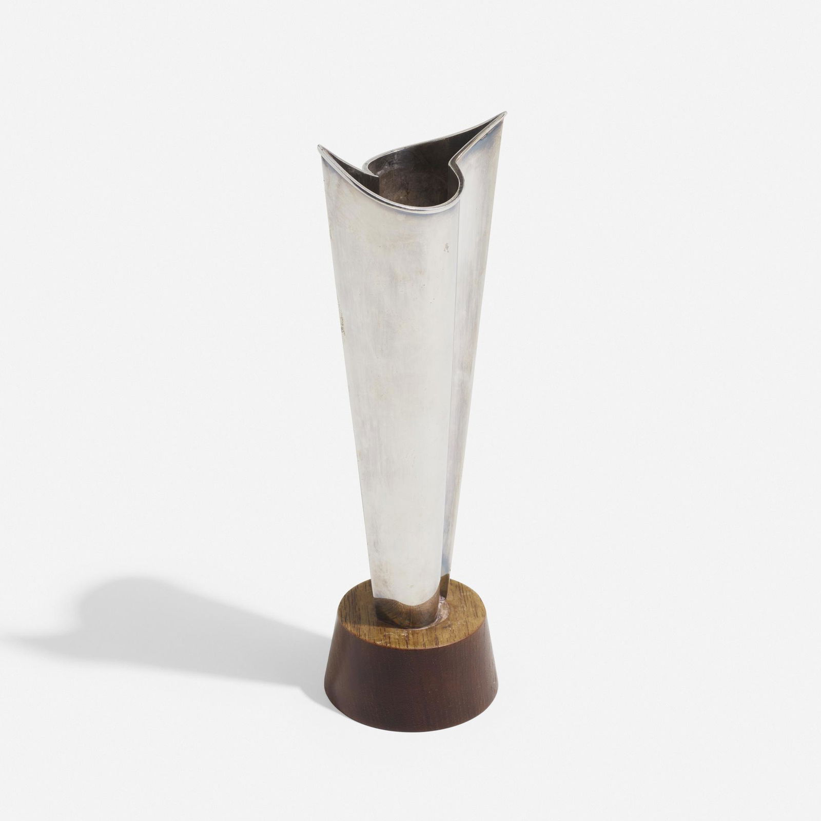 Tapio Wirkkala, Vase: Tapio Wirkkala Vase Kultakeskus OyFinland, 1960 / 1962silver, rosewood 8 h x 2.5 w x 2.25 d in (20 x 6 x 6 cm) Incised signature 'TW' with Finnish hallmarks. Literature:</