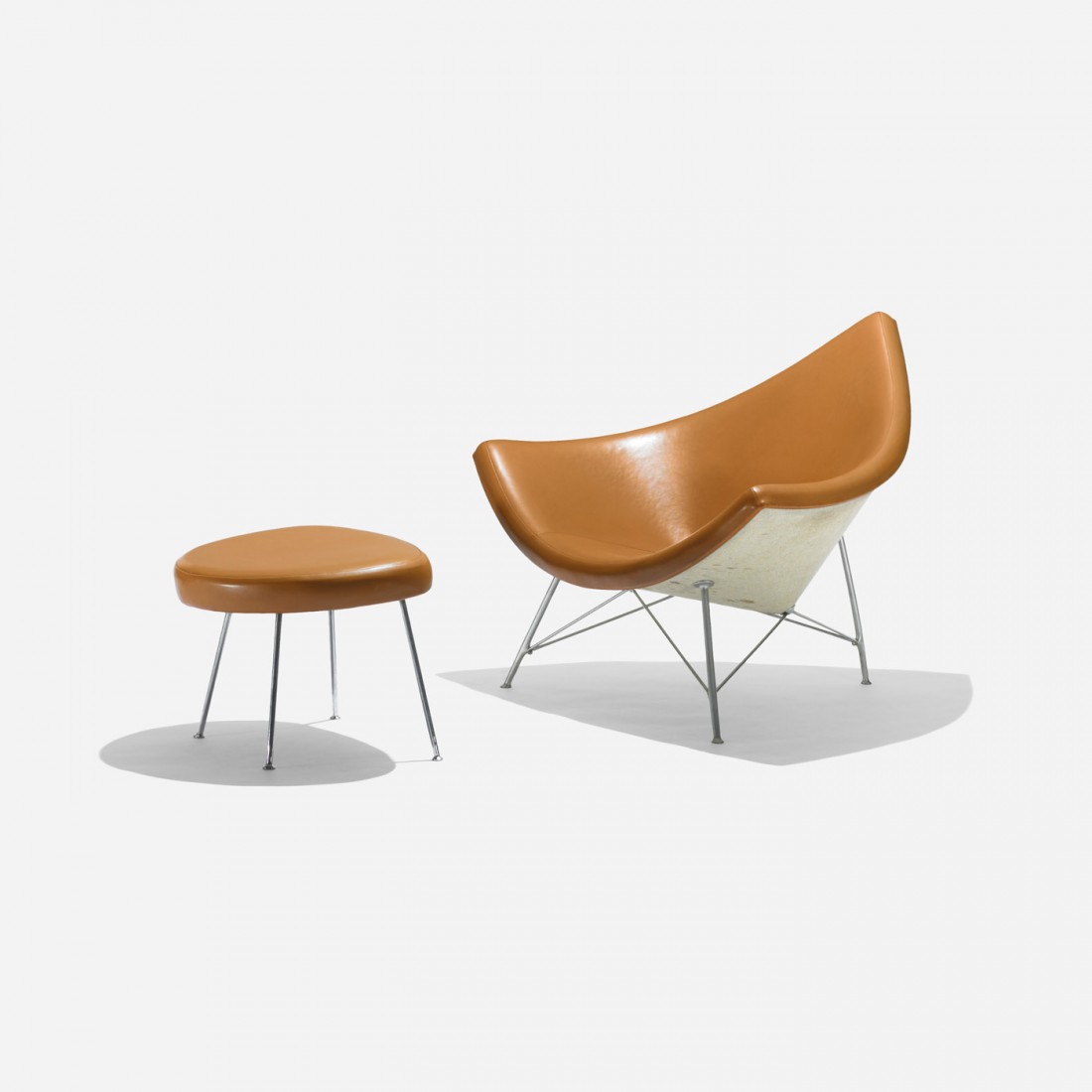 Nelson & Associates Coconut chair and ottoman: George Nelson & Associates Coconut chair and ottoman Herman Miller USA, 1956 naugahyde, enameled steel, aluminum, chrome-plated steel 41 w x 33 d x 33 h inches Ottoman measures: 23.5 w x 19 d x 17 h i