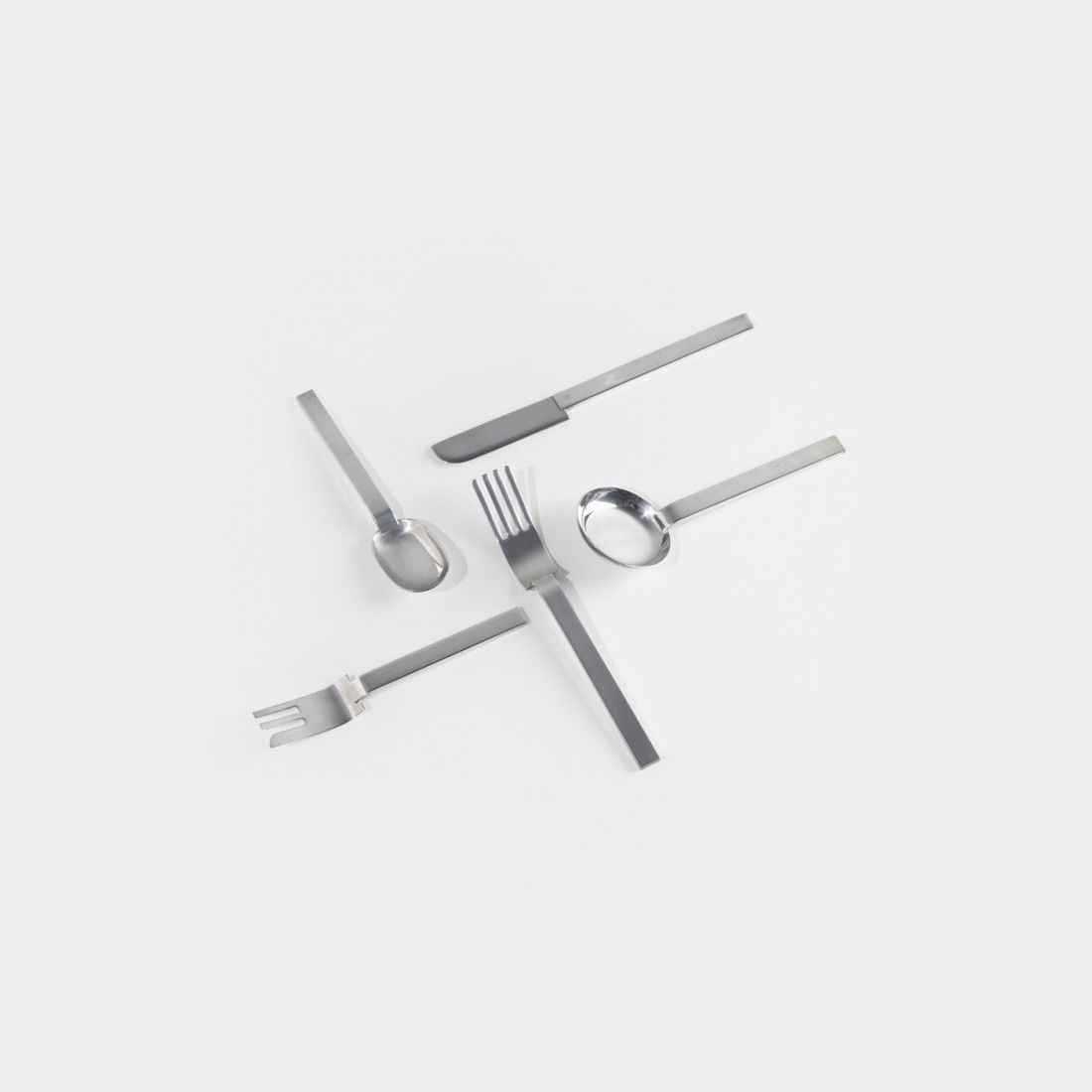 Russel Wright flatware for the MoMA: Russel Wright flatware for the Metropolitan Museum of Art USA, 1933/1987 silverplate Complete five piece service for eight; forty elements total. Signed with impressed manufacturerâ€™s mark to ea