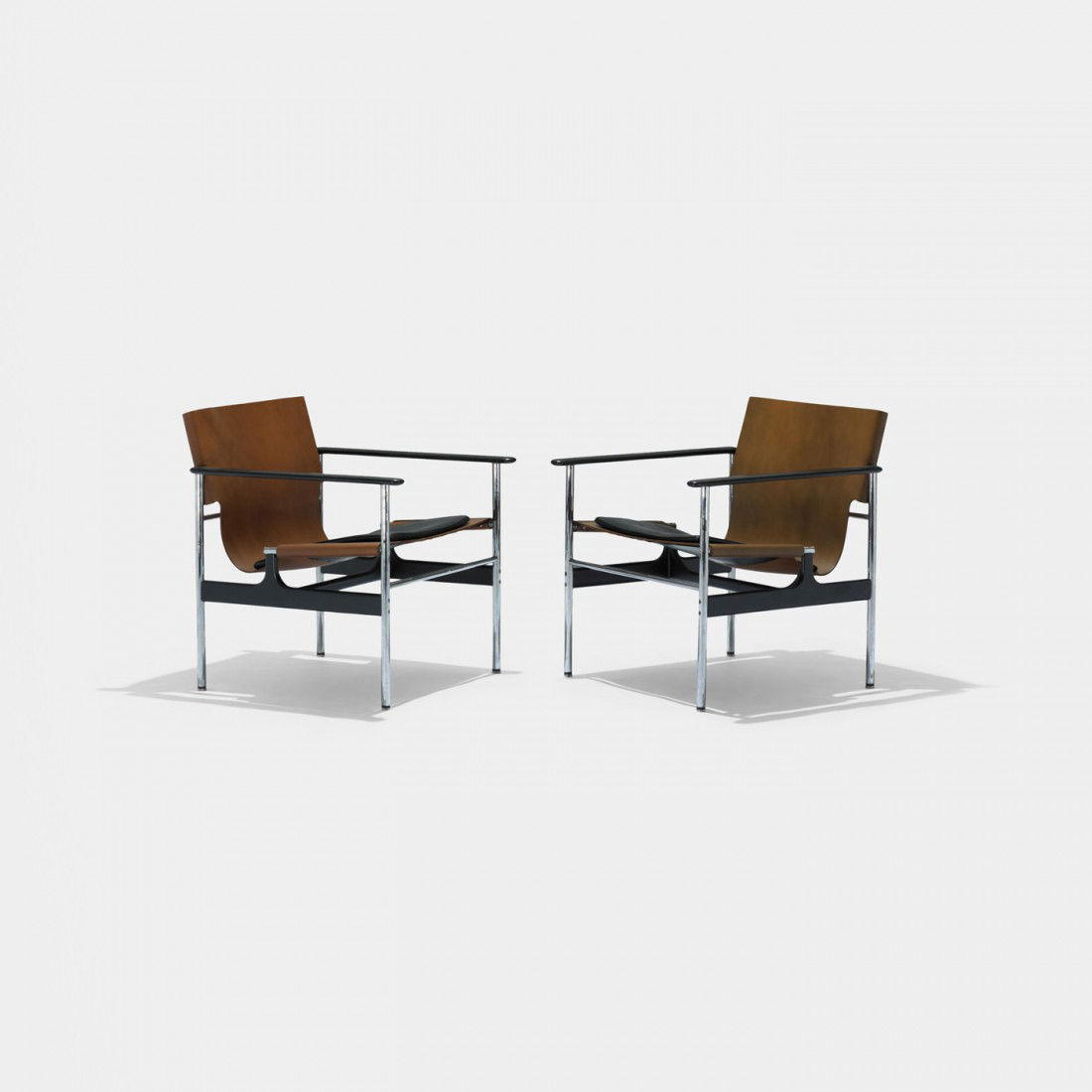 Charles Pollock Sling chairs model 657, pair: Charles Pollock Sling chairs model 657, pair Knoll Associates USA, 1964 leather, chrome-plated steel, enameled aluminum 25 w x 26 d x 28.5 h inches Signed with decal manufacturer's label to underside