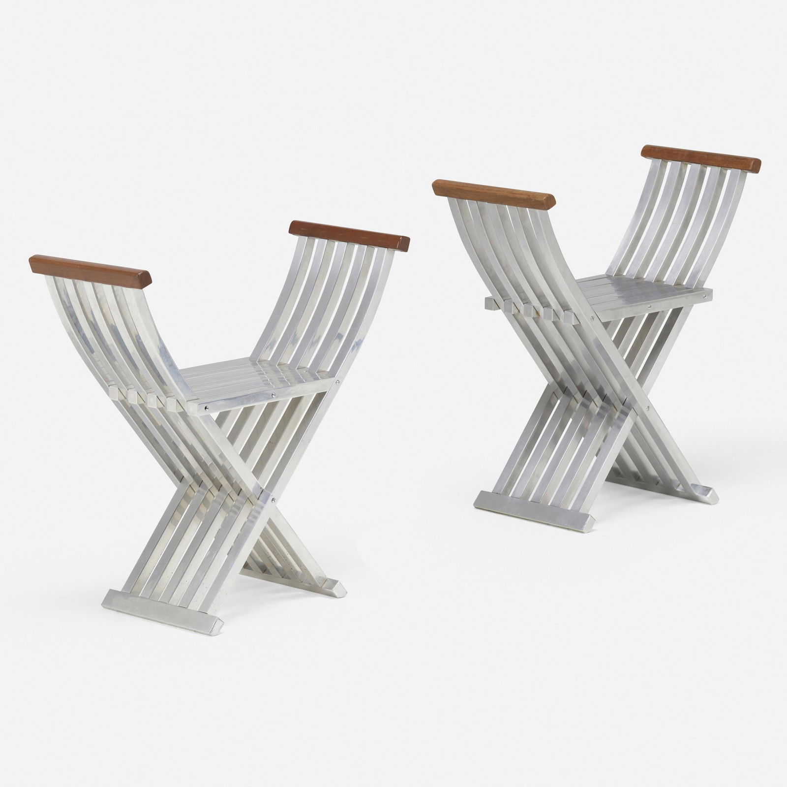 John Vesey, Classic Folding benches, pair: John Vesey Classic Folding benches, pair John Vesey, Inc.USA, c. 1958aluminum, stained walnut 27.5 h x 27 w x 12 d in (70 x 69 x 30 cm) Literature: John Vesey, Inc.</
