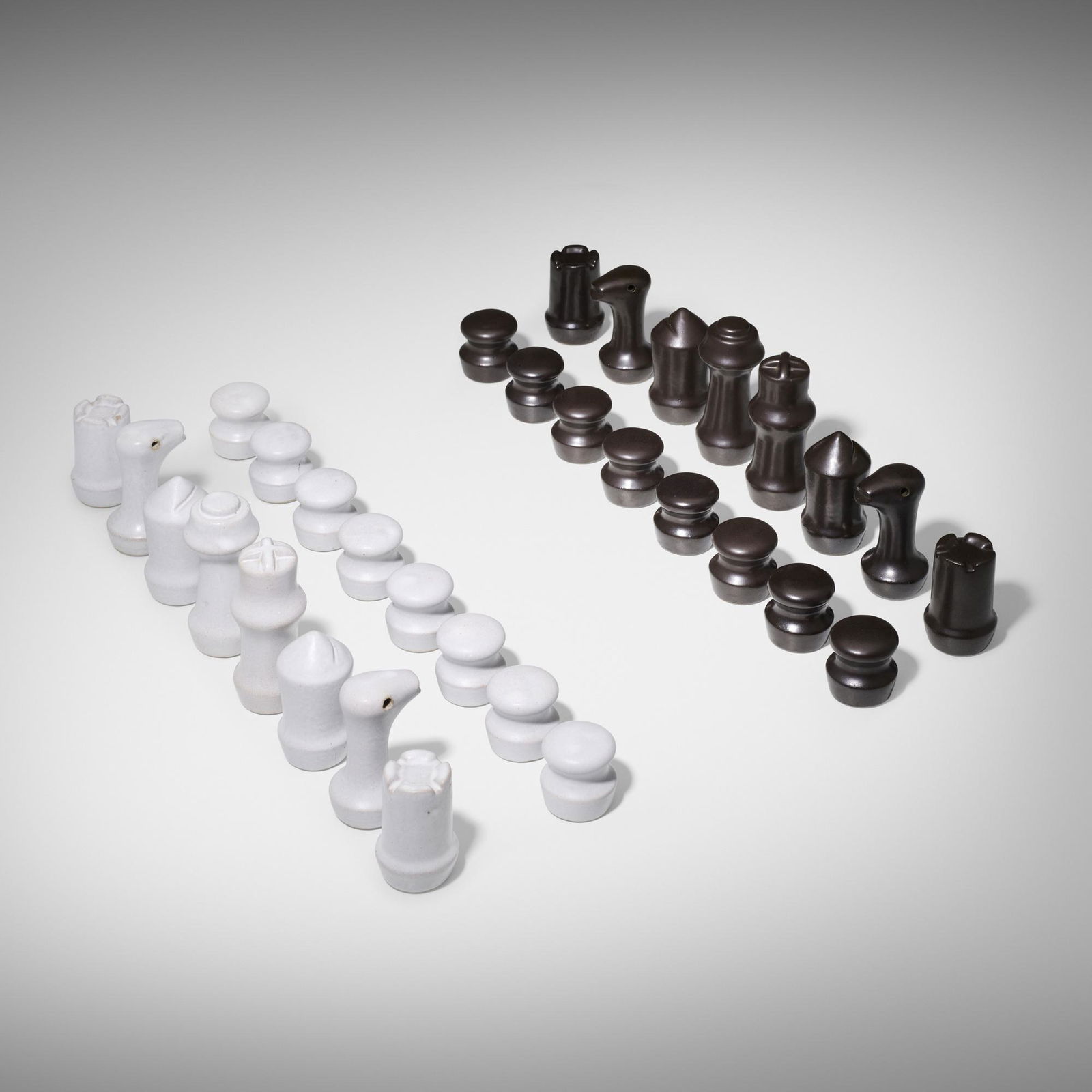 Gordon and Jane Martz, Rare chess set: Gordon and Jane Martz Rare chess set Marshall StudiosUSA, c. 1955glazed stoneware tallest: 4.75 h x 1.75 dia in (12 x 4 cm) shortest: 2 h x 1.75 dia in (5 x 4 cm) This rare set is com