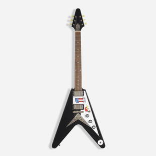 Epiphone, Flying V guitar: Epiphone Flying V guitar Qingdao Plant USA / China, 1958 / 2002 lacquered wood, rosewood, chrome-plated steel, plastic 44 h x 16.5 w x 3.75 d in (112 x 42 x 10 cm) Serial number: 20021529476 