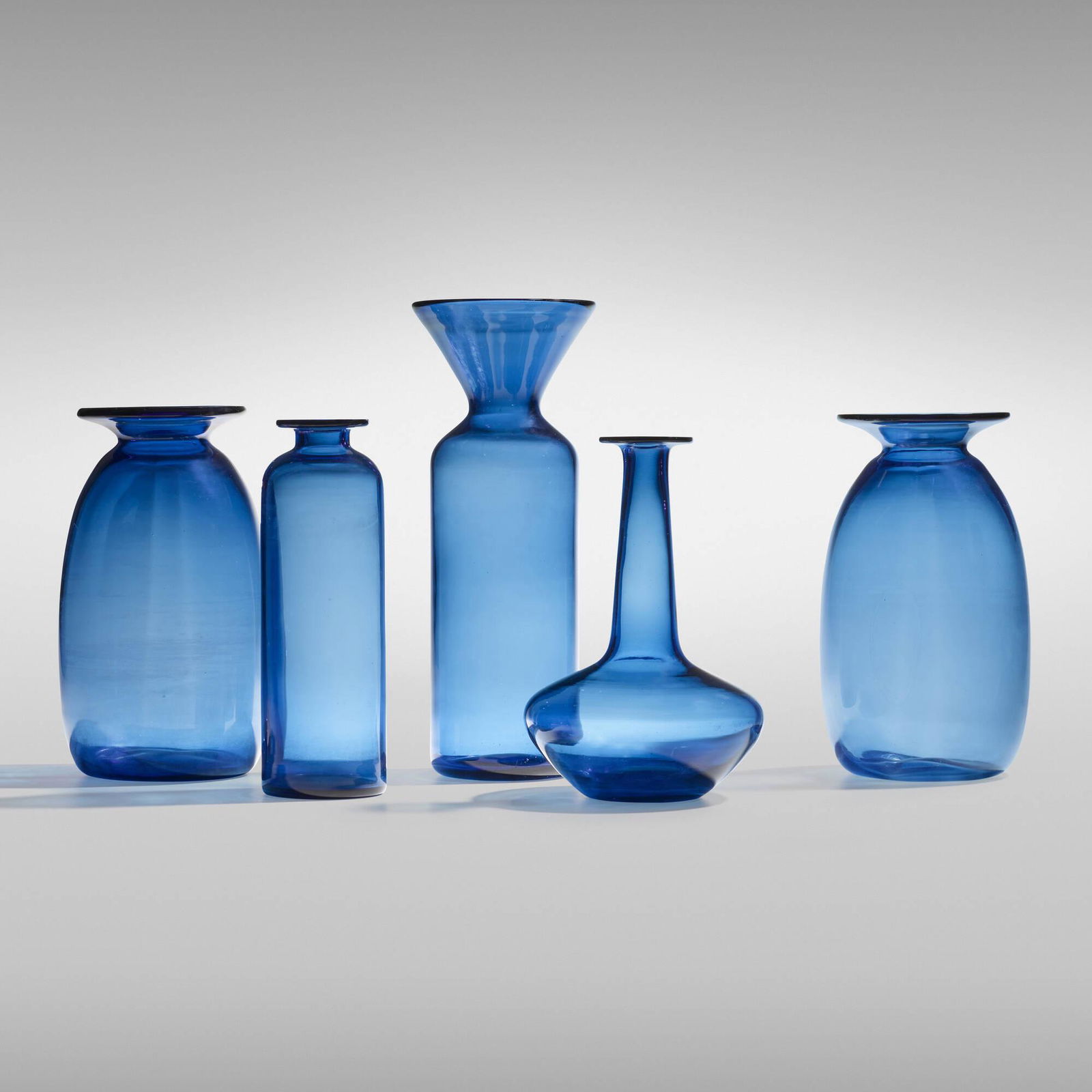 Jacob E. Bang, Vases, set of five: Jacob E. Bang Vases, set of five HolmegaardDenmark, c. 1960blown glass largest: 11.5 h x 4.5 dia in (29 x 11 cm) smallest: 8.5 h x 2.75 dia in (22 x 7 cm) This work will