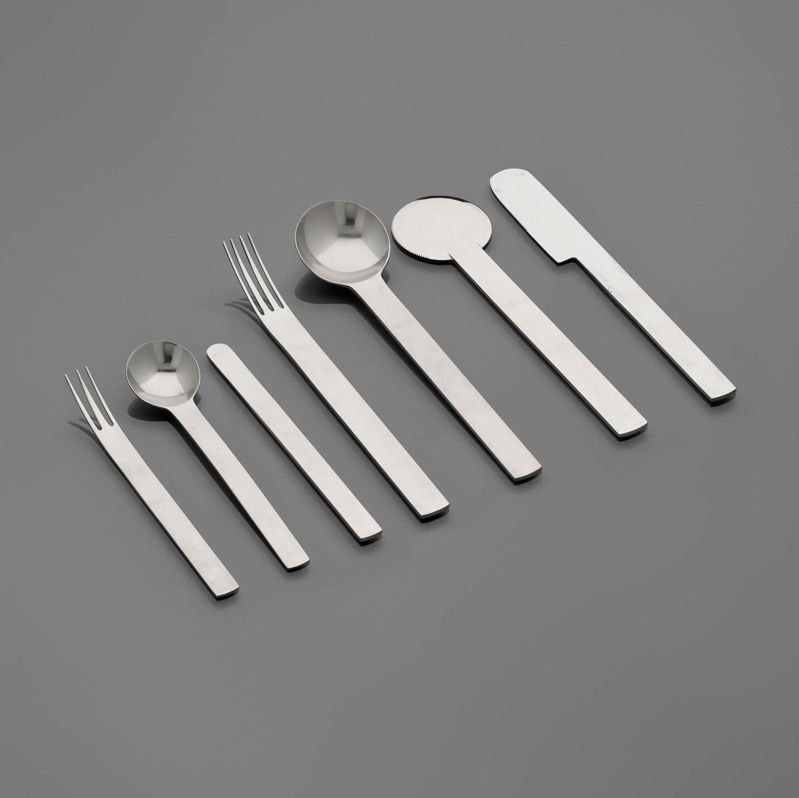 Takenobu Igarashi, TI-1 flatware service: Takenobu Igarashi TI-1 flatware service Tsubame ShinkoJapan, 1990stainless steel Seven-piece service for eleven plus additional utensils; 97 pieces total. Impressed manufacturer's mark to e