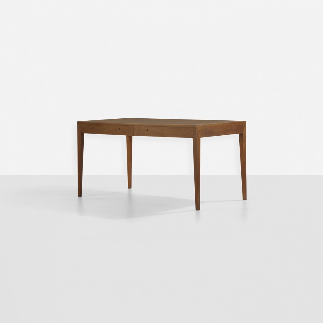 Severin Hansen desk: Severin Hansen desk Haslev Møbelsnedkeri A/S Denmark, c. 1965 teak, brass 56.26 w x 29.5 d x 28.75 h inches Desk features four locking drawers.