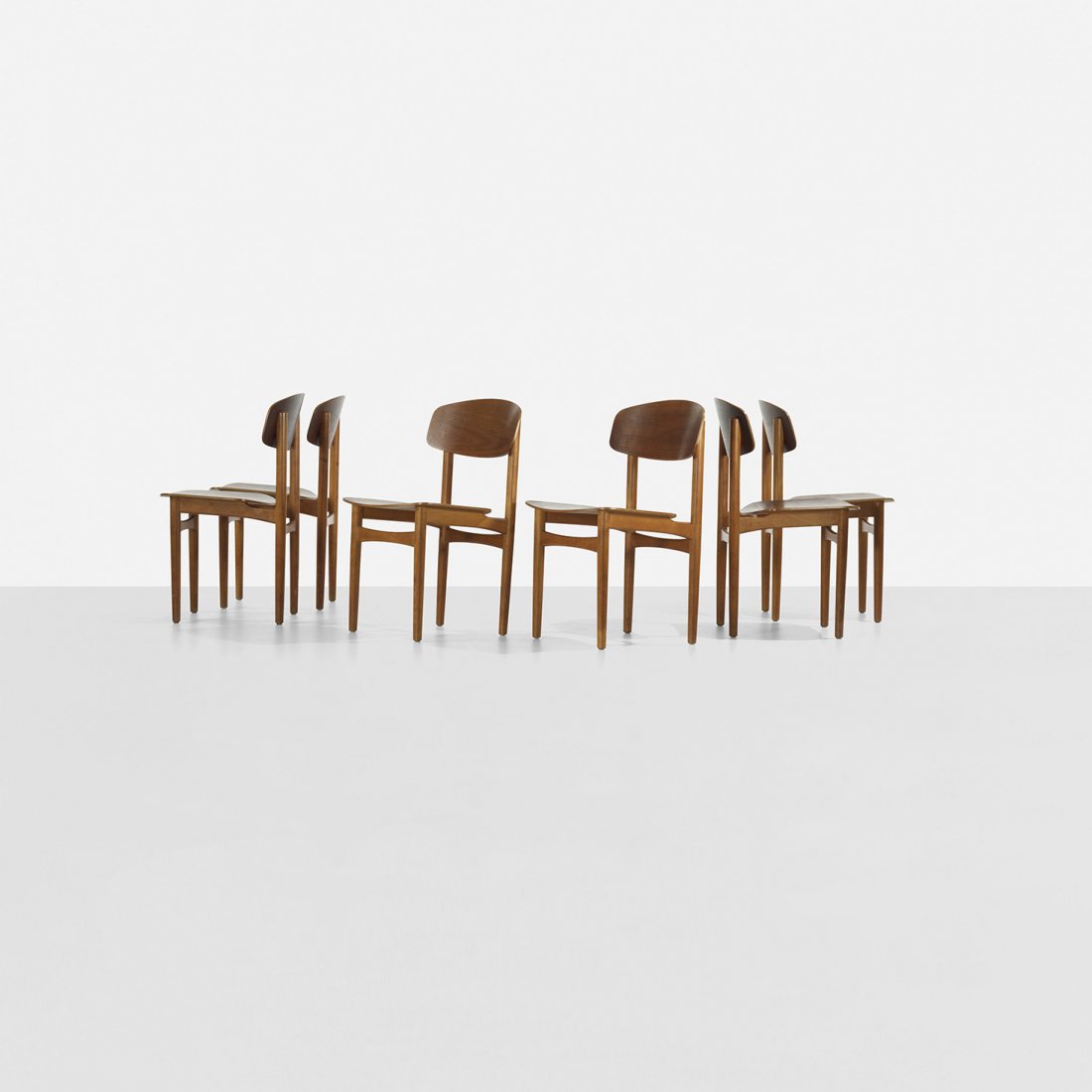 Børge Mogensen dining chairs, set of six: Børge Mogensen dining chairs, set of six Søborg Møbelfabrik Denmark, 1952 teak plywood, beech 19 w x 20 d x 31.5 h inches Signed with stamped manufacturer's mark to underside of each example: [Denm