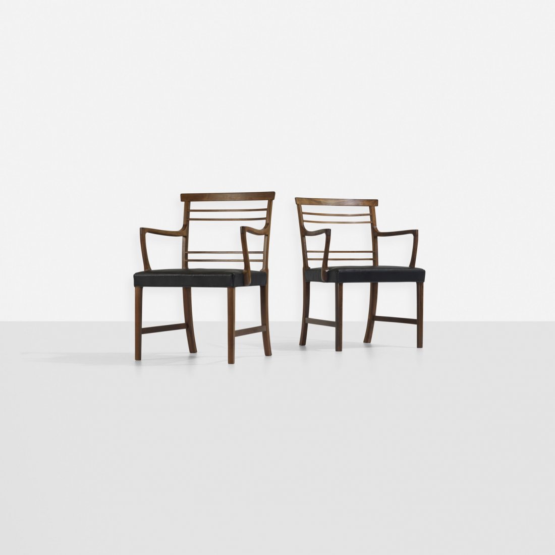 Ole Wanscher armchairs, pair: Ole Wanscher armchairs, pair A.J. Iversen Snedkermester Denmark, c. 1960 rosewood, leather 23.75 w x 21 d x 33.5 h inches Literature: Mestervaerker 100 Ars Dansk Møbelsnedkeri, Laursen, Matz and Holm