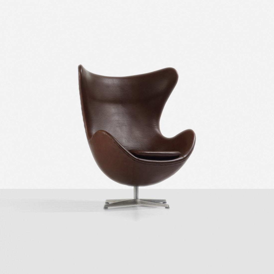 Arne Jacobsen Egg chair: Arne Jacobsen Egg chair Fritz Hansen Denmark, 1958/c. 1970 leather, aluminum, plastic 36 w x 40 d x 42.5 h inches Signed with cast manufacturer's mark to underside: [Fritz Hansen]. Literature: Arne Ja