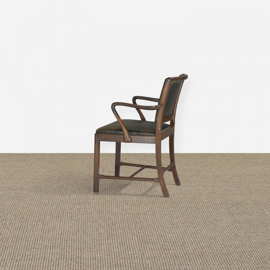 Ole Wanscher armchair: Ole Wanscher armchair A.J. Iversen Snedkermester Denmark, c. 1940 Cuban mahogany, leather 22.5 w x 24 d x 34 h inches Provenance: Collection of A.J. Iversen | Private collection