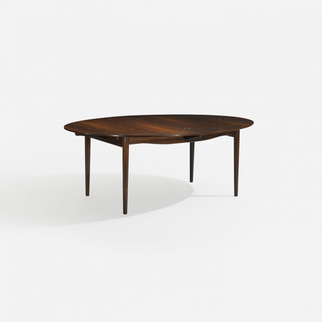 Finn Juhl Judas constellation dining table: Finn Juhl Judas constellation dining table Niels Vodder Denmark, c. 1950 rosewood, silver inlay 79 w x 55 d x 28.5 h inches Sold with two 21.5-inch leaves; table measures 122 inches when fully extende