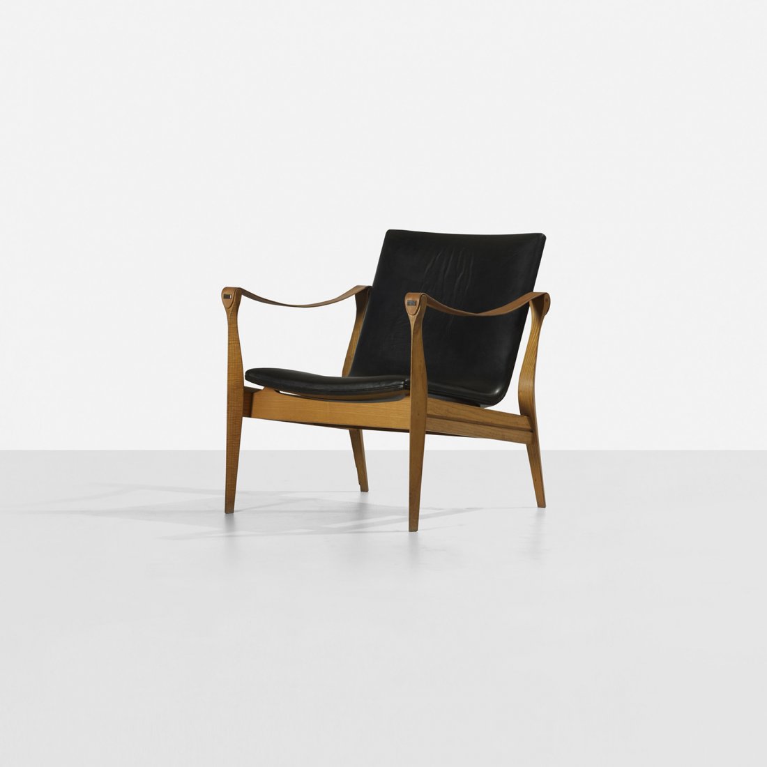 Karen and Ebbe Clemmensen lounge chair, model 4305: Karen and Ebbe Clemmensen lounge chair, model 4305 Fritz Hansen Denmark, 1963 ash, leather, brass 24.25 w x 26 d x 28 h inches Signed with decal manufacturer's label to underside: [FH Made in Denmark